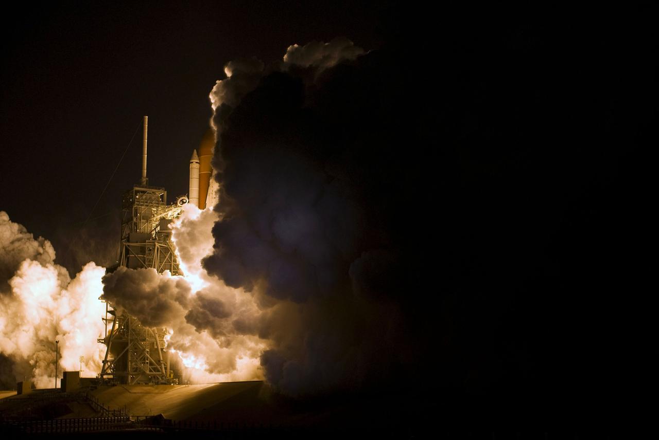 STS119-S-024 (15 March 2009) --- The Space Shuttle Discovery and its seven-member STS-119 crew head toward Earth orbit and a scheduled link-up with the International Space Station. Liftoff was on time at 7:43 p.m. (EDT) on March 15, 2009 from launch pad 39A at NASA’s Kennedy Space Center. Onboard are astronauts Lee Archambault, commander; Tony Antonelli, pilot; Joseph Acaba, Steve Swanson, Richard Arnold, John Phillips and Japan Aerospace Exploration Agency’s Koichi Wakata, all mission specialists. Wakata will join Expedition 18 in progress to serve as a flight engineer aboard the space station. Discovery will deliver the final pair of power-generating solar array wings and the S6 truss segment. Installation of S6 will signal the station's readiness to house a six-member crew for conducting increased science.