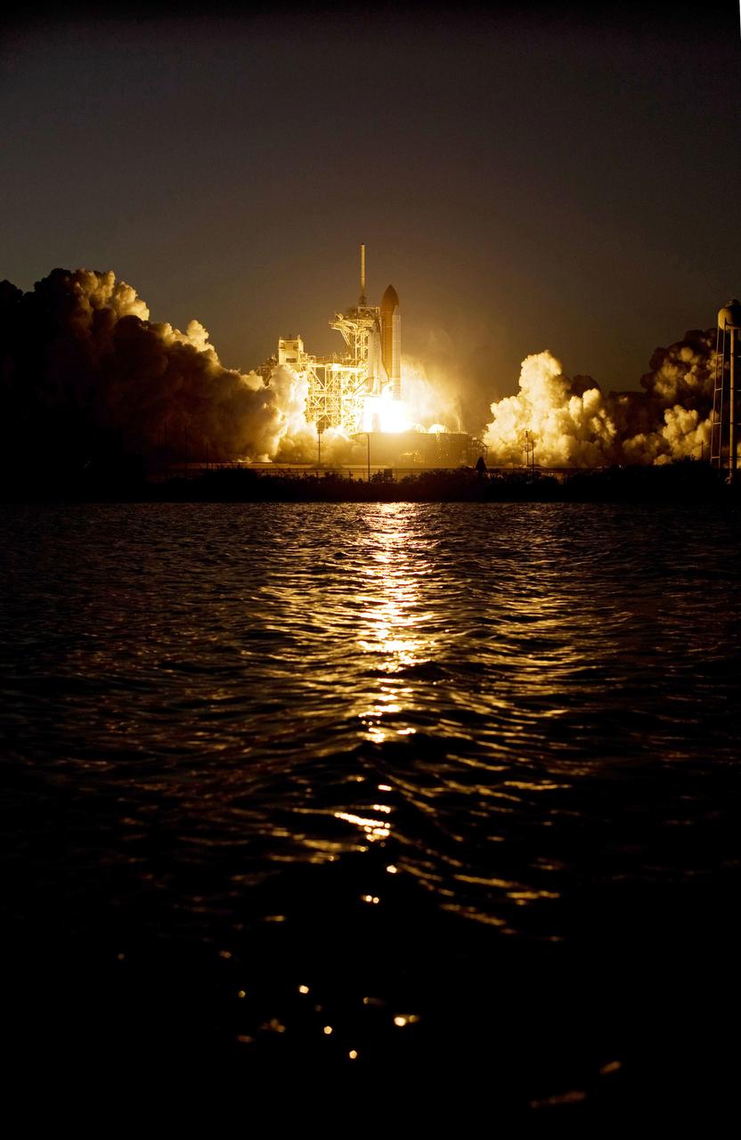 STS119-S-028 (15 March 2009) --- The Space Shuttle Discovery and its seven-member STS-119 crew head toward Earth orbit and a scheduled link-up with the International Space Station. Liftoff was on time at 7:43 p.m. (EDT) on March 15, 2009 from launch pad 39A at NASA’s Kennedy Space Center. Onboard are astronauts Lee Archambault, commander; Tony Antonelli, pilot; Joseph Acaba, Steve Swanson, Richard Arnold, John Phillips and Japan Aerospace Exploration Agency’s Koichi Wakata, all mission specialists. Wakata will join Expedition 18 in progress to serve as a flight engineer aboard the space station. Discovery will deliver the final pair of power-generating solar array wings and the S6 truss segment. Installation of S6 will signal the station's readiness to house a six-member crew for conducting increased science.