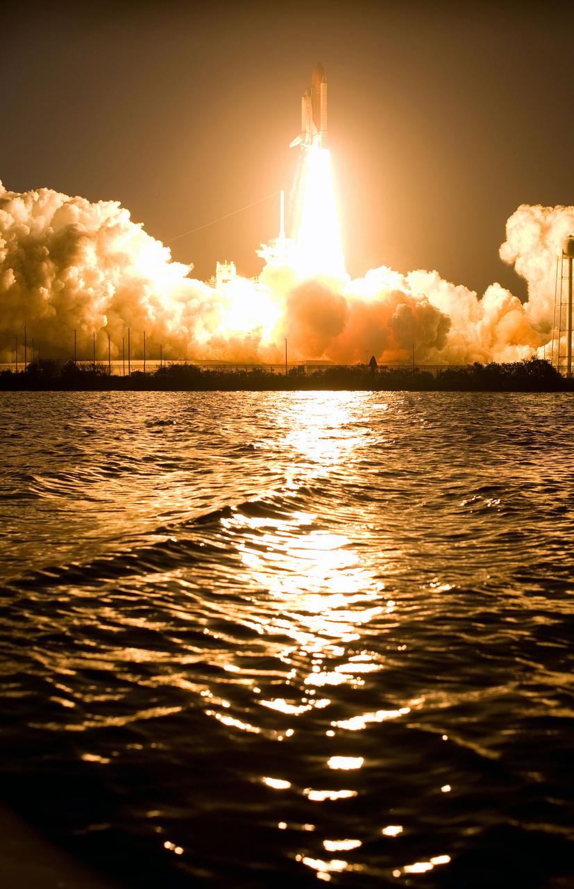 STS119-S-029 (15 March 2009) --- The Space Shuttle Discovery and its seven-member STS-119 crew head toward Earth orbit and a scheduled link-up with the International Space Station. Liftoff was on time at 7:43 p.m. (EDT) on March 15, 2009 from launch pad 39A at NASA’s Kennedy Space Center. Onboard are astronauts Lee Archambault, commander; Tony Antonelli, pilot; Joseph Acaba, Steve Swanson, Richard Arnold, John Phillips and Japan Aerospace Exploration Agency’s Koichi Wakata, all mission specialists. Wakata will join Expedition 18 in progress to serve as a flight engineer aboard the space station. Discovery will deliver the final pair of power-generating solar array wings and the S6 truss segment. Installation of S6 will signal the station's readiness to house a six-member crew for conducting increased science.