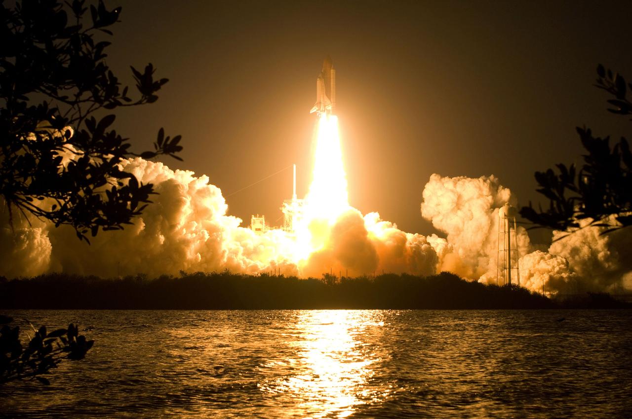 STS119-S-037 (15 March 2009) --- The Space Shuttle Discovery and its seven-member STS-119 crew head toward Earth orbit and a scheduled link-up with the International Space Station. Liftoff was on time at 7:43 p.m. (EDT) on March 15, 2009 from launch pad 39A at NASA’s Kennedy Space Center. Onboard are astronauts Lee Archambault, commander; Tony Antonelli, pilot; Joseph Acaba, Steve Swanson, Richard Arnold, John Phillips and Japan Aerospace Exploration Agency’s Koichi Wakata, all mission specialists. Wakata will join Expedition 18 in progress to serve as a flight engineer aboard the space station. Discovery will deliver the final pair of power-generating solar array wings and the S6 truss segment. Installation of S6 will signal the station's readiness to house a six-member crew for conducting increased science.