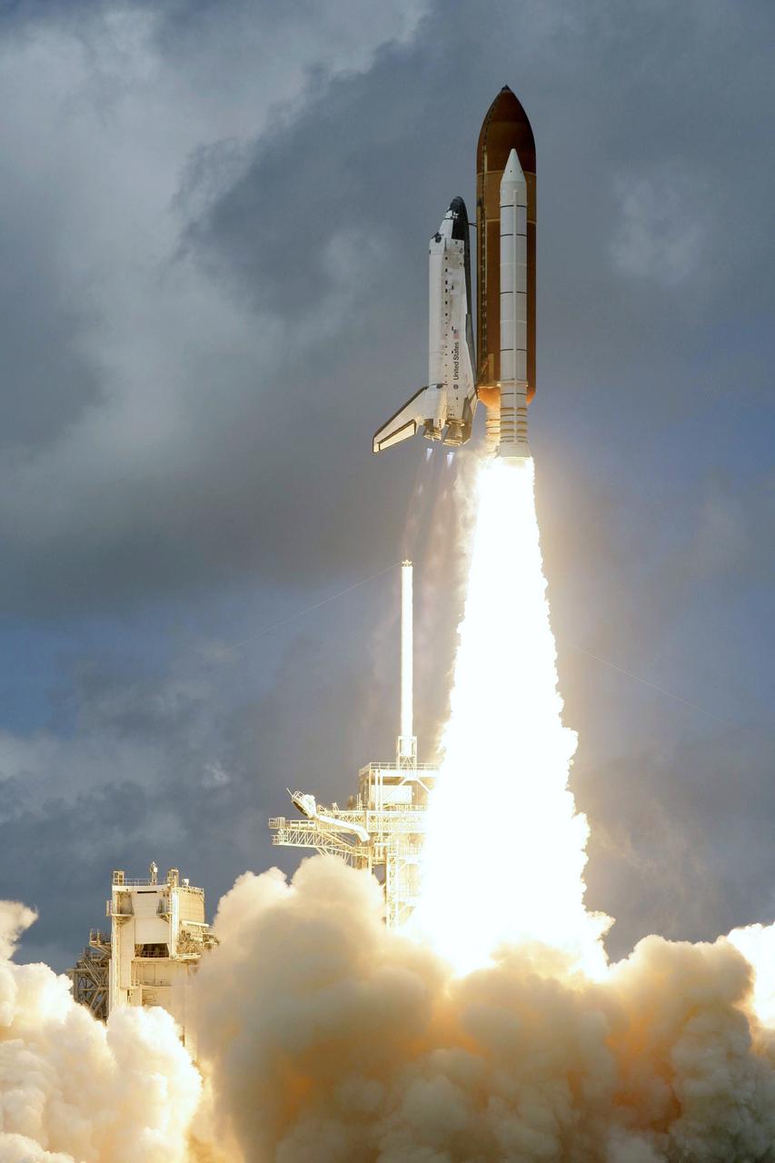 STS120-S-009 (23 Oct. 2007) --- The Space Shuttle Discovery and its seven-member STS-120 crew head toward Earth-orbit and a scheduled link-up with the International Space Station. Liftoff from Kennedy Space Center's launch pad 39A occurred at 11:38:19 a.m. (EDT). Onboard are astronauts Pam Melroy, commander; George Zamka, pilot; Scott Parazynski, Stephanie Wilson, Doug Wheelock, European Space Agency's (ESA) Paolo Nespoli and Daniel Tani, all mission specialists. Discovery will link up with the station on Thursday, Oct. 25, to begin a joint mission to continue construction by delivering the Italian-built U.S. Node 2, called Harmony. During the 14-day mission, the crew will install Harmony and move the P6 solar arrays to their permanent position and deploy them.