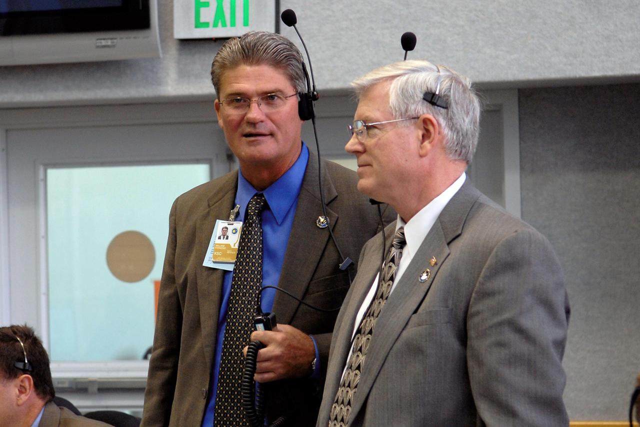 STS120-S-012 (23 Oct. 2007) --- In the firing room of the Launch Control Center at NASA's Kennedy Space Center, KSC Director Bill Parsons (left) and Johnson Space Center Director Michael Coats wait for the final countdown of Space Shuttle Discovery on mission STS-120. Liftoff was on time at 11:38:19 a.m. (EDT). Discovery carries the Italian-built U.S. Node 2, called Harmony. During the 14-day STS-120 mission, the crew will install Harmony and move the P6 solar arrays to their permanent position and deploy them.
