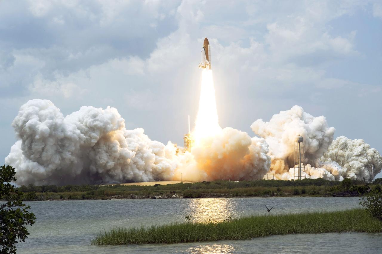 STS125-S-025 (11 May 2009) --- Space Shuttle Atlantis and its seven-member STS-125 crew head toward Earth orbit and rendezvous with NASA?s Hubble Space Telescope. Liftoff was on time at 2:01 p.m. (EDT) on May 11, 2009 from launch pad 39A at NASA's Kennedy Space Center. Onboard are astronauts Scott Altman, commander; Gregory C. Johnson, pilot; Michael Good, Megan McArthur, John Grunsfeld, Mike Massimino and Andrew Feustel, all mission specialists. Atlantis' 11-day flight will include five spacewalks to refurbish and upgrade the telescope with state-of-the-art science instruments that will expand Hubble's capabilities and extend its operational lifespan through at least 2014. The payload includes Wide Field Camera 3, fine guidance sensor and the Cosmic Origins Spectrograph.
