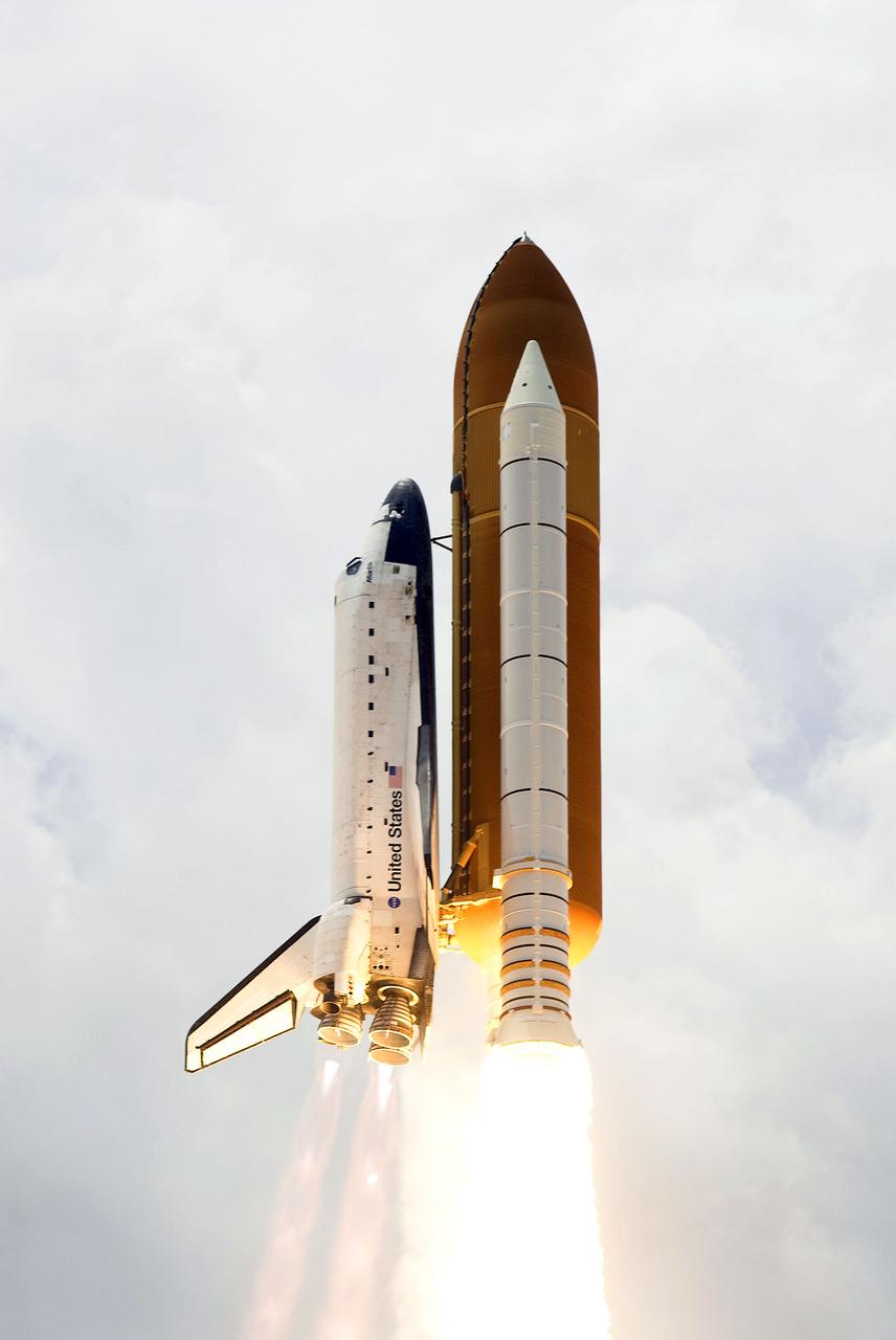 STS125-S-034 (11 May 2009) --- Space Shuttle Atlantis and its seven-member STS-125 crew head toward Earth orbit and rendezvous with NASA?s Hubble Space Telescope. Liftoff was on time at 2:01 p.m. (EDT) on May 11, 2009 from launch pad 39A at NASA's Kennedy Space Center. Onboard are astronauts Scott Altman, commander; Gregory C. Johnson, pilot; Michael Good, Megan McArthur, John Grunsfeld, Mike Massimino and Andrew Feustel, all mission specialists. Atlantis' 11-day flight will include five spacewalks to refurbish and upgrade the telescope with state-of-the-art science instruments that will expand Hubble's capabilities and extend its operational lifespan through at least 2014. The payload includes Wide Field Camera 3, fine guidance sensor and the Cosmic Origins Spectrograph.