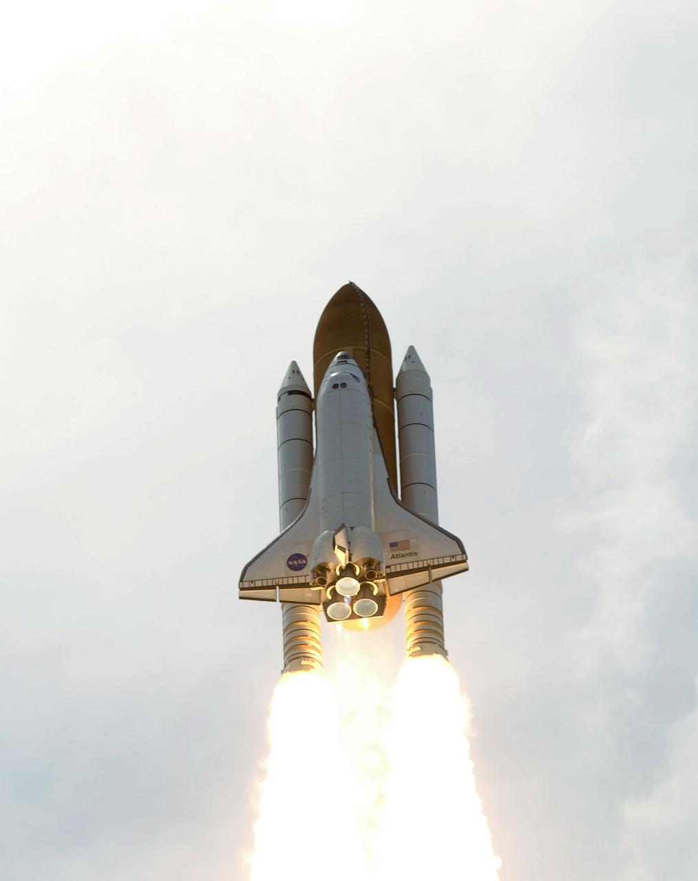 STS125-S-035 (11 May 2009) --- Space Shuttle Atlantis and its seven-member STS-125 crew head toward Earth orbit and rendezvous with NASA?s Hubble Space Telescope. Liftoff was on time at 2:01 p.m. (EDT) on May 11, 2009 from launch pad 39A at NASA's Kennedy Space Center. Onboard are astronauts Scott Altman, commander; Gregory C. Johnson, pilot; Michael Good, Megan McArthur, John Grunsfeld, Mike Massimino and Andrew Feustel, all mission specialists. Atlantis' 11-day flight will include five spacewalks to refurbish and upgrade the telescope with state-of-the-art science instruments that will expand Hubble's capabilities and extend its operational lifespan through at least 2014. The payload includes Wide Field Camera 3, fine guidance sensor and the Cosmic Origins Spectrograph.