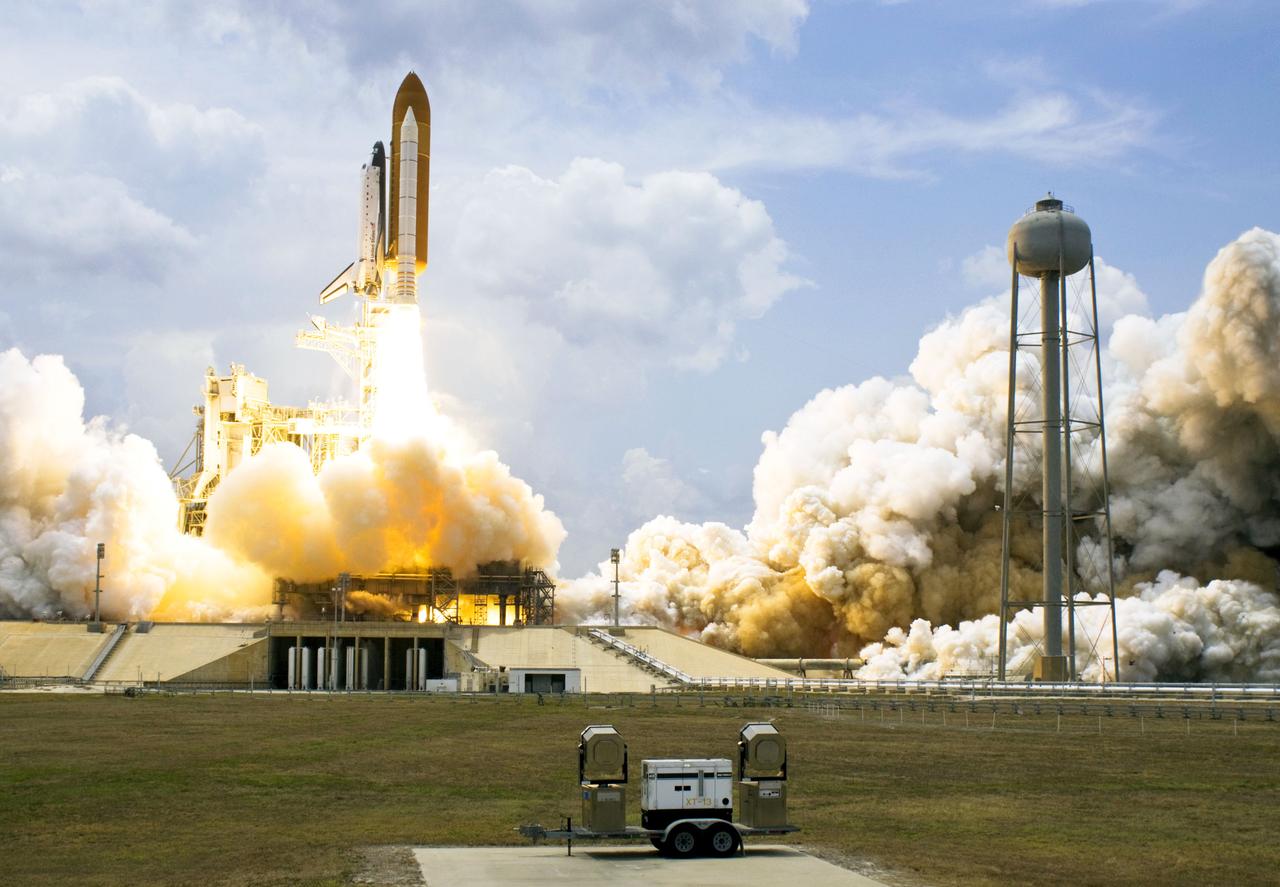 STS125-S-051 (11 May 2009) --- Space Shuttle Atlantis and its seven-member STS-125 crew head toward Earth orbit and rendezvous with NASA?s Hubble Space Telescope. Liftoff was on time at 2:01 p.m. (EDT) on May 11, 2009 from launch pad 39A at NASA's Kennedy Space Center. Onboard are astronauts Scott Altman, commander; Gregory C. Johnson, pilot; Michael Good, Megan McArthur, John Grunsfeld, Mike Massimino and Andrew Feustel, all mission specialists. Atlantis' 11-day flight will include five spacewalks to refurbish and upgrade the telescope with state-of-the-art science instruments that will expand Hubble's capabilities and extend its operational lifespan through at least 2014. The payload includes Wide Field Camera 3, fine guidance sensor and the Cosmic Origins Spectrograph.