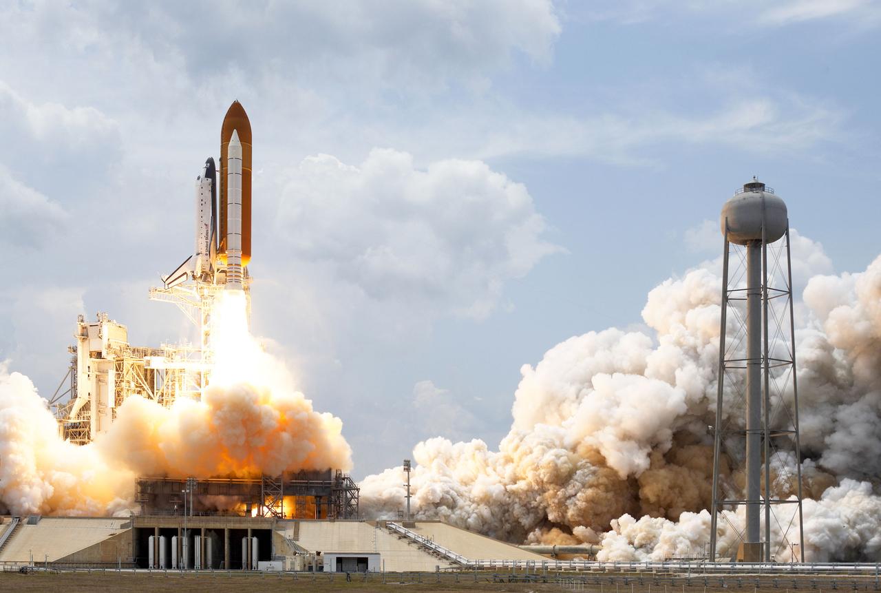 STS125-S-055 (11 May 2009) --- Space Shuttle Atlantis and its seven-member STS-125 crew head toward Earth orbit and rendezvous with NASA?s Hubble Space Telescope. Liftoff was on time at 2:01 p.m. (EDT) on May 11, 2009 from launch pad 39A at NASA's Kennedy Space Center. Onboard are astronauts Scott Altman, commander; Gregory C. Johnson, pilot; Michael Good, Megan McArthur, John Grunsfeld, Mike Massimino and Andrew Feustel, all mission specialists. Atlantis' 11-day flight will include five spacewalks to refurbish and upgrade the telescope with state-of-the-art science instruments that will expand Hubble's capabilities and extend its operational lifespan through at least 2014. The payload includes Wide Field Camera 3, fine guidance sensor and the Cosmic Origins Spectrograph.