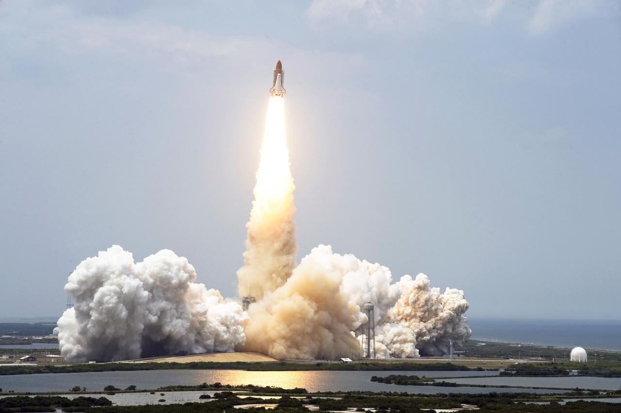 STS125-S-056 (11 May 2009) --- Space Shuttle Atlantis and its seven-member STS-125 crew head toward Earth orbit and rendezvous with NASA?s Hubble Space Telescope. Liftoff was on time at 2:01 p.m. (EDT) on May 11, 2009 from launch pad 39A at NASA's Kennedy Space Center. Onboard are astronauts Scott Altman, commander; Gregory C. Johnson, pilot; Michael Good, Megan McArthur, John Grunsfeld, Mike Massimino and Andrew Feustel, all mission specialists. Atlantis' 11-day flight will include five spacewalks to refurbish and upgrade the telescope with state-of-the-art science instruments that will expand Hubble's capabilities and extend its operational lifespan through at least 2014. The payload includes Wide Field Camera 3, fine guidance sensor and the Cosmic Origins Spectrograph.