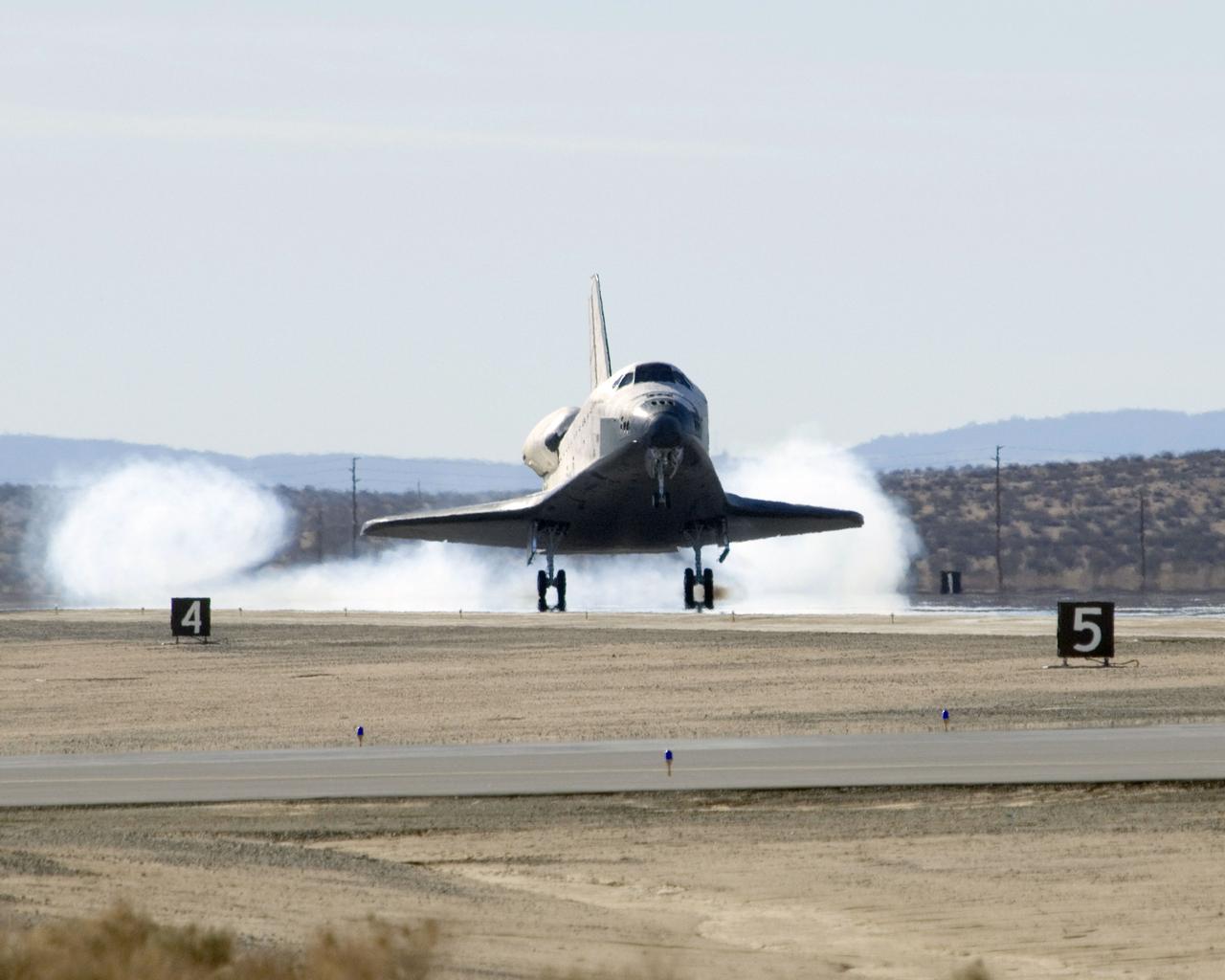 STS126-S-046 (30 Nov. 2008) --- Space Shuttle Endeavour's main landing gear touches down at NASA's Dryden Flight Research Center at Edwards Air Force Base in California, concluding a successful mission to the International Space Station. Endeavour landed at 1:25 p.m. (PST) on Nov. 30, 2008 to end the STS-126 mission, completing its 16-day journey of over 6.6 million miles in space. The landing was diverted to California due to marginal weather at the Kennedy Space Center. The main landing gear touched down at 1:25:06 p.m. (PST). The nose landing gear touched down at 1:25:21 p.m. and wheel stop was at 1:26:03 p.m. The STS-126 mission was the 27th flight to the International Space Station, carrying equipment and supplies in the Multi-Purpose Logistics Module Leonardo. The mission featured four spacewalks and work to prepare the space station to house six crewmembers for long-duration missions. Onboard were astronauts Chris Ferguson, commander; Eric Boe, pilot; Heidemarie Stefanyshyn-Piper, Donald Pettit, Steve Bowen, Shane Kimbrough and Greg Chamitoff, all mission specialists.