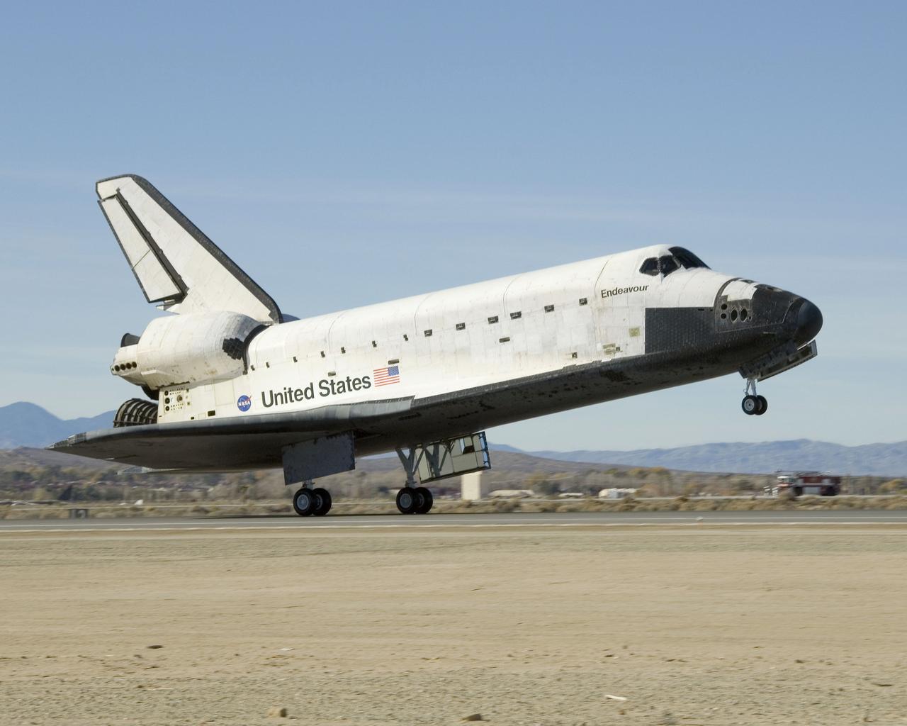 STS126-S-047 (30 Nov. 2008) --- Space Shuttle Endeavour's main landing gear touches down at NASA's Dryden Flight Research Center at Edwards Air Force Base in California, concluding a successful mission to the International Space Station. Endeavour landed at 1:25 p.m. (PST) on Nov. 30, 2008 to end the STS-126 mission, completing its 16-day journey of over 6.6 million miles in space. The landing was diverted to California due to marginal weather at the Kennedy Space Center. The main landing gear touched down at 1:25:06 p.m. (PST). The nose landing gear touched down at 1:25:21 p.m. and wheel stop was at 1:26:03 p.m. The STS-126 mission was the 27th flight to the International Space Station, carrying equipment and supplies in the Multi-Purpose Logistics Module Leonardo. The mission featured four spacewalks and work to prepare the space station to house six crewmembers for long-duration missions. Onboard were astronauts Chris Ferguson, commander; Eric Boe, pilot; Heidemarie Stefanyshyn-Piper, Donald Pettit, Steve Bowen, Shane Kimbrough and Greg Chamitoff, all mission specialists.