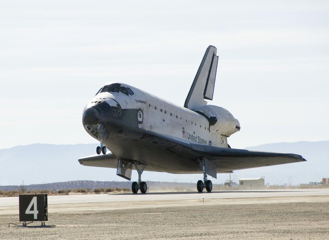 STS126-S-048 (30 Nov. 2008) --- Space Shuttle Endeavour's main landing gear touches down at NASA's Dryden Flight Research Center at Edwards Air Force Base in California, concluding a successful mission to the International Space Station. Endeavour landed at 1:25 p.m. (PST) on Nov. 30, 2008 to end the STS-126 mission, completing its 16-day journey of over 6.6 million miles in space. The landing was diverted to California due to marginal weather at the Kennedy Space Center. The main landing gear touched down at 1:25:06 p.m. (PST). The nose landing gear touched down at 1:25:21 p.m. and wheel stop was at 1:26:03 p.m. The STS-126 mission was the 27th flight to the International Space Station, carrying equipment and supplies in the Multi-Purpose Logistics Module Leonardo. The mission featured four spacewalks and work to prepare the space station to house six crewmembers for long-duration missions. Onboard were astronauts Chris Ferguson, commander; Eric Boe, pilot; Heidemarie Stefanyshyn-Piper, Donald Pettit, Steve Bowen, Shane Kimbrough and Greg Chamitoff, all mission specialists.