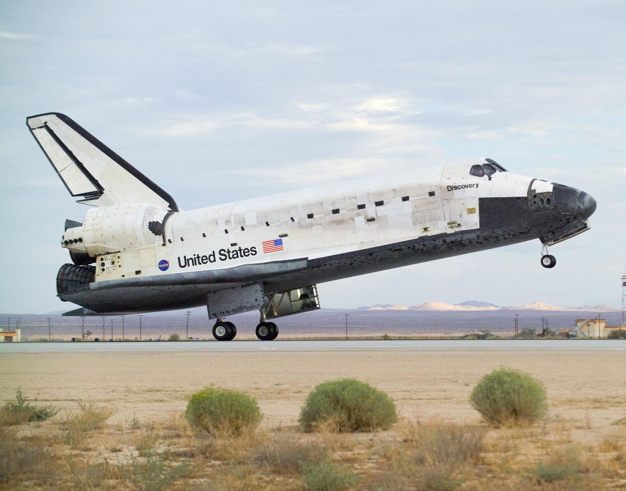 STS128-S-047 (11 Sept. 2009) --- Space Shuttle Discovery?s main landing gear touches down at NASA's Dryden Flight Research Center at Edwards Air Force Base in California, concluding a successful mission to the International Space Station. Onboard are NASA astronauts Rick Sturckow, commander; Kevin Ford, pilot; John ?Danny? Olivas, Patrick Forrester, Jose Hernandez and Tim Kopra, all mission specialists; along with European Space Agency astronaut Christer Fuglesang, mission specialist. Discovery landed at 5:53 p.m. (PDT) on Sept. 11, 2009 to end the STS-128 mission, completing its almost 14-day journey of more than 5.7 million miles in space. The landing was diverted to California due to marginal weather at the Kennedy Space Center. Discovery?s mission featured three spacewalks and the delivery of two refrigerator-sized science racks to the space station. One rack will be used to conduct experiments on materials such as metals, glasses and ceramics. The results from these experiments could lead to the development of better materials on Earth. The other rack will be used for fluid physics research. Understanding how fluids react in microgravity could lead to improved designs for fuel tanks, water systems and other fluid-based systems.
