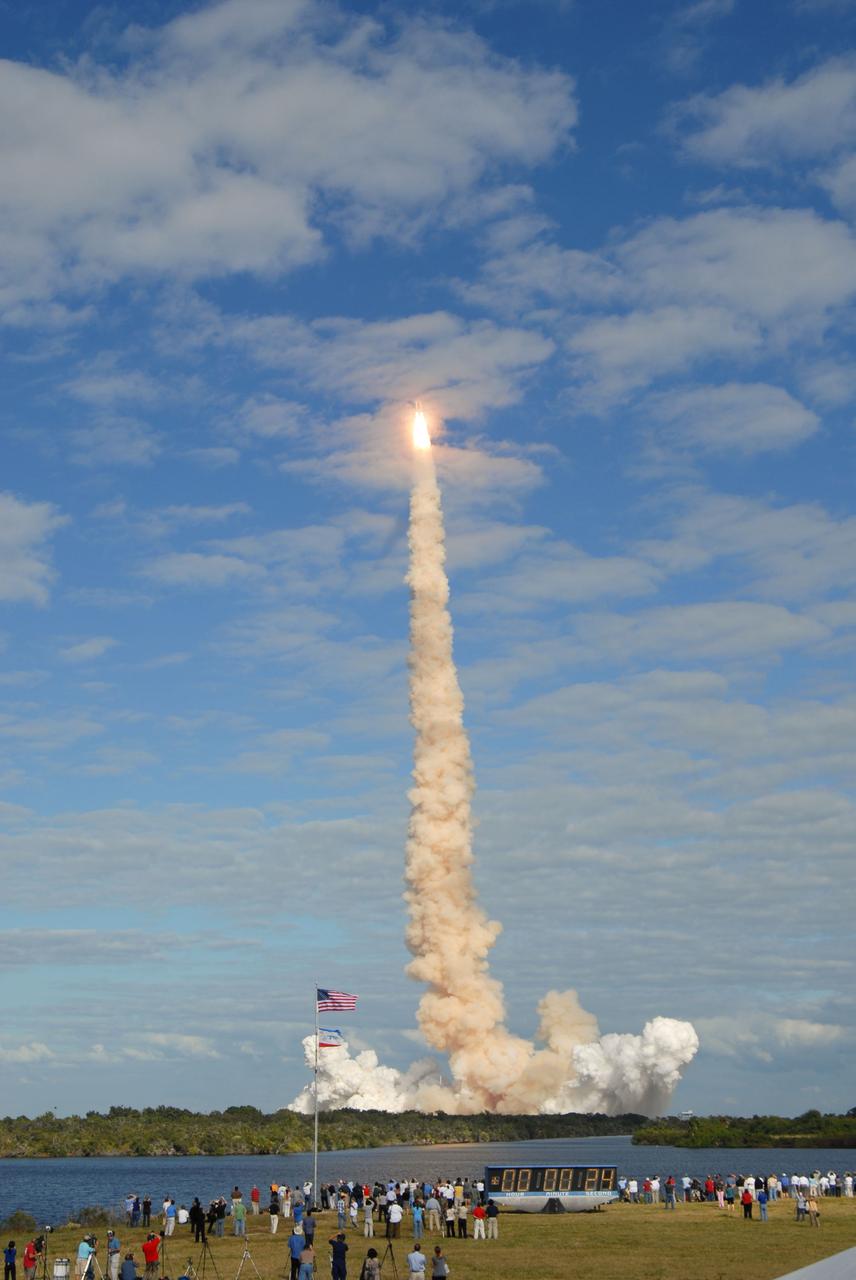 CAPE CANAVERAL, Fla. - Space shuttle Atlantis launches through the clouds from Launch Pad 39A on a balmy Florida afternoon at NASA's Kennedy Space Center. Liftoff on its STS-129 mission came at 2:28 p.m. EST Nov. 16. Aboard are crew members Commander Charles O. Hobaugh; Pilot Barry E. Wilmore; and Mission Specialists Leland Melvin, Randy Bresnik, Mike Foreman and Robert L. Satcher Jr. On STS-129, the crew will deliver two Express Logistics Carriers to the International Space Station, the largest of the shuttle's cargo carriers, containing 15 spare pieces of equipment including two gyroscopes, two nitrogen tank assemblies, two pump modules, an ammonia tank assembly and a spare latching end effector for the station's robotic arm. Atlantis will return to Earth a station crew member, Nicole Stott, who has spent more than two months aboard the orbiting laboratory. STS-129 is slated to be the final space shuttle Expedition crew rotation flight. For information on the STS-129 mission and crew, visit http://www.nasa.gov/mission_pages/shuttle/shuttlemissions/sts129/index.html. Photo credit: NASA/Jim Grossmann  