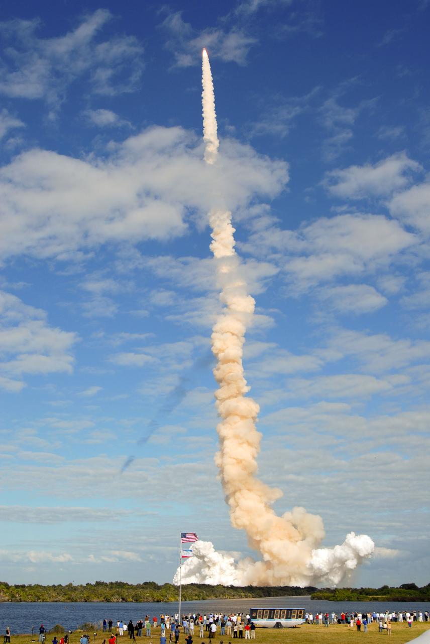 CAPE CANAVERAL, Fla. - Space shuttle Atlantis cuts its way through the blue skies over Launch Pad 39A at NASA's Kennedy Space Center in Florida. Liftoff on its STS-129 mission came at 2:28 p.m. EST Nov. 16. Aboard are crew members Commander Charles O. Hobaugh; Pilot Barry E. Wilmore; and Mission Specialists Leland Melvin, Randy Bresnik, Mike Foreman and Robert L. Satcher Jr. On STS-129, the crew will deliver two Express Logistics Carriers to the International Space Station, the largest of the shuttle's cargo carriers, containing 15 spare pieces of equipment including two gyroscopes, two nitrogen tank assemblies, two pump modules, an ammonia tank assembly and a spare latching end effector for the station's robotic arm. Atlantis will return to Earth a station crew member, Nicole Stott, who has spent more than two months aboard the orbiting laboratory. STS-129 is slated to be the final space shuttle Expedition crew rotation flight. For information on the STS-129 mission and crew, visit http://www.nasa.gov/mission_pages/shuttle/shuttlemissions/sts129/index.html. Photo credit: NASA/Jim Grossmann  