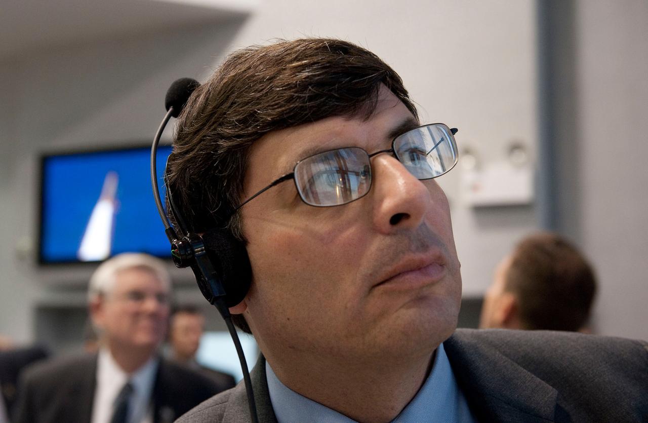 NASA Associate Administrator Chris Scolese monitors the launch of the space shuttle Atlantis from firing room four of the NASA Kennedy Space Center, Monday, Nov. 16, 2009, Cape Canaveral, FL.  Space shuttle Atlantis and its six-member crew began the 11-day STS-129 mission to the International Space Station. The shuttle will transport spare hardware to the outpost and return a station crew member who spent more than two months in space.  Photo Credit: (NASA/Bill Ingalls)