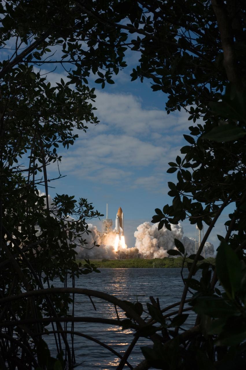 STS129-S-046 (16 Nov. 2009) --- Space Shuttle Atlantis and its six-member STS-129 crew head toward Earth orbit and rendezvous with the International Space Station. Liftoff was on time at 2:28 p.m. (EST) on Nov. 16, 2009 from launch pad 39A at NASA?s Kennedy Space Center, Florida. Onboard are astronauts Charles O. Hobaugh, commander; Barry E. Wilmore, pilot; along with Leland Melvin, Mike Foreman, Robert L. Satcher Jr. and Randy Bresnik, all mission specialists. Atlantis will deliver two Express Logistics Carriers to the station, the largest of the shuttle's cargo carriers, containing 15 spare pieces of equipment including two gyroscopes, two nitrogen tank assemblies, two pump modules, an ammonia tank assembly and a spare latching end effector for the station's robotic arm. Atlantis will return to Earth a station crew member, Nicole Stott, who has spent more than two months aboard the orbiting laboratory. STS-129 is slated to be the final space shuttle Expedition crew rotation flight.