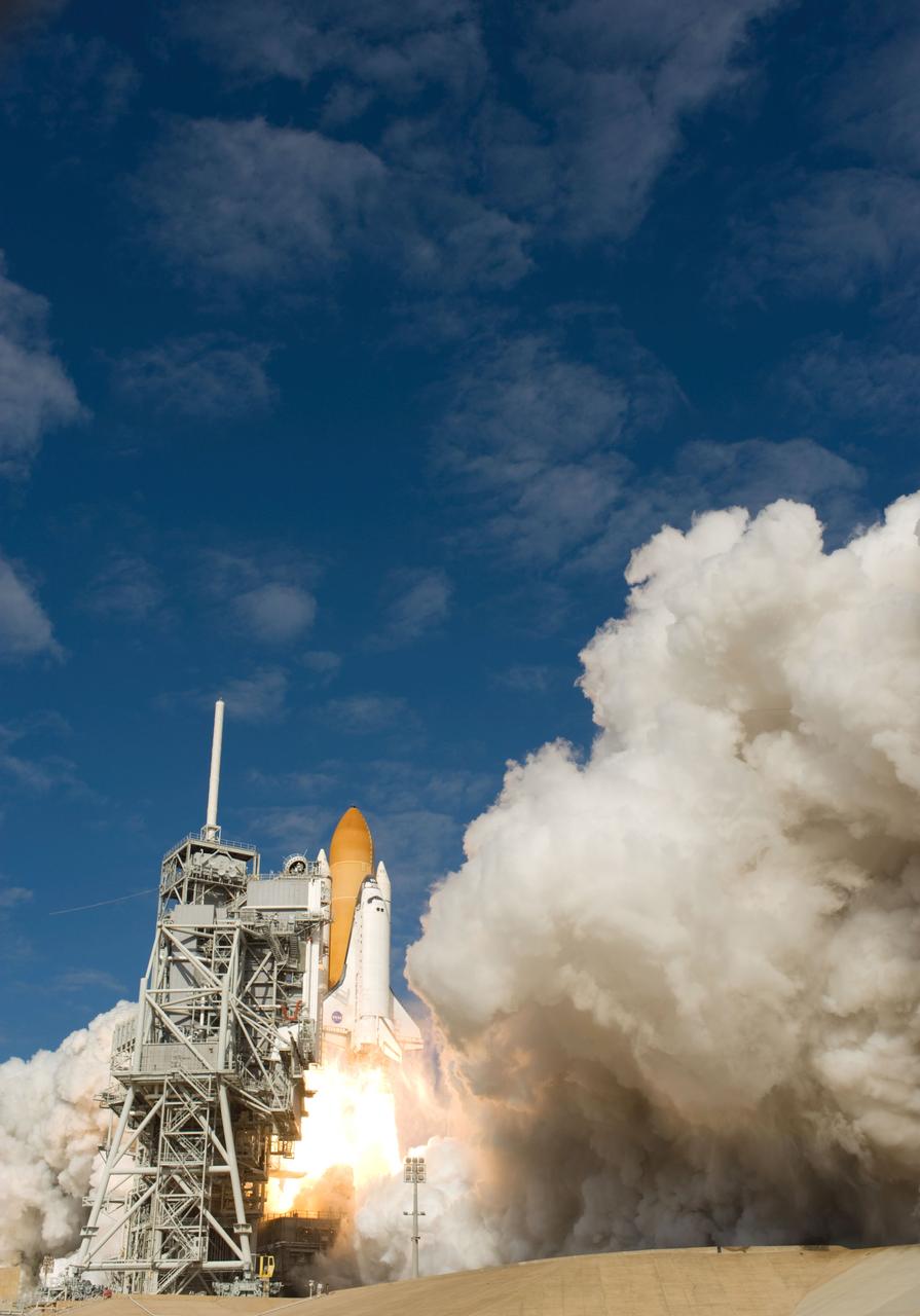 STS129-S-051 (16 Nov. 2009) --- Space Shuttle Atlantis and its six-member STS-129 crew head toward Earth orbit and rendezvous with the International Space Station. Liftoff was on time at 2:28 p.m. (EST) on Nov. 16, 2009 from launch pad 39A at NASA?s Kennedy Space Center, Florida. Onboard are astronauts Charles O. Hobaugh, commander; Barry E. Wilmore, pilot; along with Leland Melvin, Mike Foreman, Robert L. Satcher Jr. and Randy Bresnik, all mission specialists. Atlantis will deliver two Express Logistics Carriers to the station, the largest of the shuttle's cargo carriers, containing 15 spare pieces of equipment including two gyroscopes, two nitrogen tank assemblies, two pump modules, an ammonia tank assembly and a spare latching end effector for the station's robotic arm. Atlantis will return to Earth a station crew member, Nicole Stott, who has spent more than two months aboard the orbiting laboratory. STS-129 is slated to be the final space shuttle Expedition crew rotation flight.