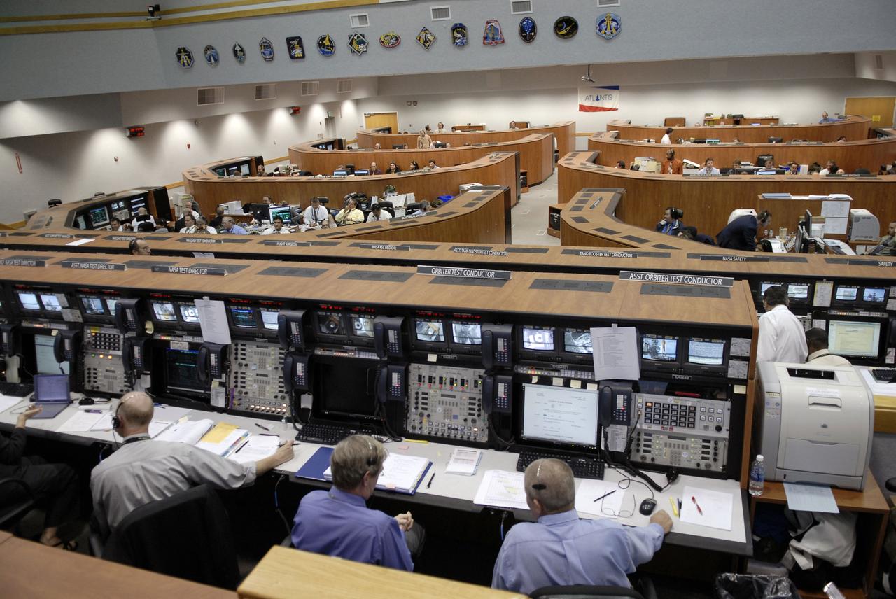 STS129-S-055 (16 Nov. 2009) --- The space shuttle launch team monitors the progress of Space Shuttle Atlantis' countdown from consoles on the main floor of Firing Room 4 in Kennedy's Launch Control Center. Liftoff of Atlantis from Launch Pad 39A on its STS-129 mission to the International Space Station came at 2:28 p.m. (EST) Nov. 16, 2009.