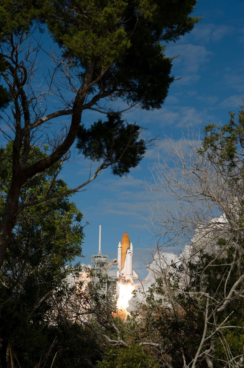 STS129-S-060 (16 Nov. 2009) --- Space Shuttle Atlantis and its six-member STS-129 crew head toward Earth orbit and rendezvous with the International Space Station. Liftoff was on time at 2:28 p.m. (EST) on Nov. 16, 2009 from launch pad 39A at NASA?s Kennedy Space Center, Florida. Onboard are astronauts Charles O. Hobaugh, commander; Barry E. Wilmore, pilot; along with Leland Melvin, Mike Foreman, Robert L. Satcher Jr. and Randy Bresnik, all mission specialists. Atlantis will deliver two Express Logistics Carriers to the station, the largest of the shuttle's cargo carriers, containing 15 spare pieces of equipment including two gyroscopes, two nitrogen tank assemblies, two pump modules, an ammonia tank assembly and a spare latching end effector for the station's robotic arm. Atlantis will return to Earth a station crew member, Nicole Stott, who has spent more than two months aboard the orbiting laboratory. STS-129 is slated to be the final space shuttle Expedition crew rotation flight.