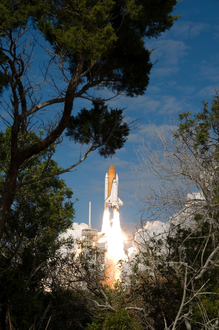 STS129-S-061 (16 Nov. 2009) --- Space Shuttle Atlantis and its six-member STS-129 crew head toward Earth orbit and rendezvous with the International Space Station. Liftoff was on time at 2:28 p.m. (EST) on Nov. 16, 2009 from launch pad 39A at NASA?s Kennedy Space Center, Florida. Onboard are astronauts Charles O. Hobaugh, commander; Barry E. Wilmore, pilot; along with Leland Melvin, Mike Foreman, Robert L. Satcher Jr. and Randy Bresnik, all mission specialists. Atlantis will deliver two Express Logistics Carriers to the station, the largest of the shuttle's cargo carriers, containing 15 spare pieces of equipment including two gyroscopes, two nitrogen tank assemblies, two pump modules, an ammonia tank assembly and a spare latching end effector for the station's robotic arm. Atlantis will return to Earth a station crew member, Nicole Stott, who has spent more than two months aboard the orbiting laboratory. STS-129 is slated to be the final space shuttle Expedition crew rotation flight.