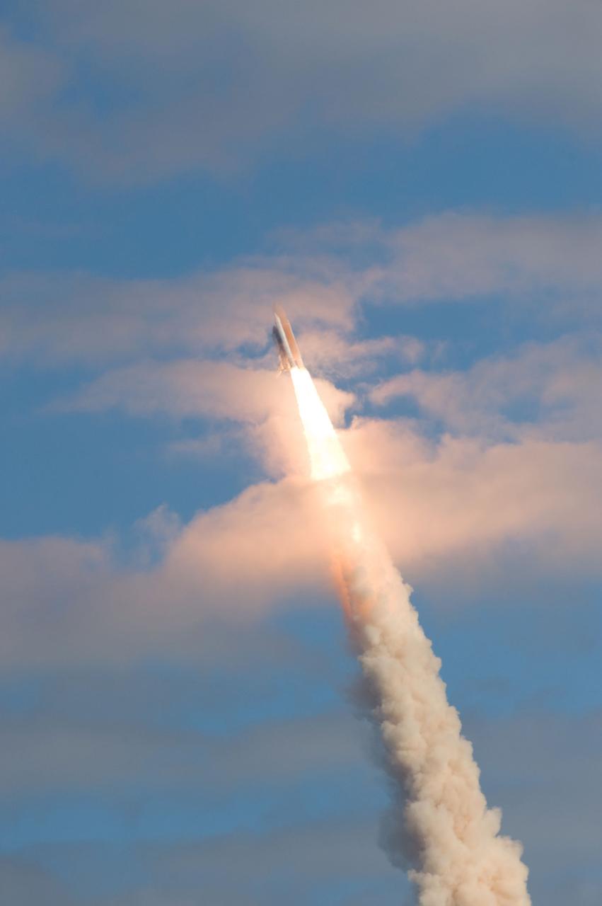 STS129-S-065 (16 Nov. 2009) --- Space Shuttle Atlantis and its six-member STS-129 crew head toward Earth orbit and rendezvous with the International Space Station. Liftoff was on time at 2:28 p.m. (EST) on Nov. 16, 2009 from launch pad 39A at NASA?s Kennedy Space Center, Florida. Onboard are astronauts Charles O. Hobaugh, commander; Barry E. Wilmore, pilot; along with Leland Melvin, Mike Foreman, Robert L. Satcher Jr. and Randy Bresnik, all mission specialists. Atlantis will deliver two Express Logistics Carriers to the station, the largest of the shuttle's cargo carriers, containing 15 spare pieces of equipment including two gyroscopes, two nitrogen tank assemblies, two pump modules, an ammonia tank assembly and a spare latching end effector for the station's robotic arm. Atlantis will return to Earth a station crew member, Nicole Stott, who has spent more than two months aboard the orbiting laboratory. STS-129 is slated to be the final space shuttle Expedition crew rotation flight.