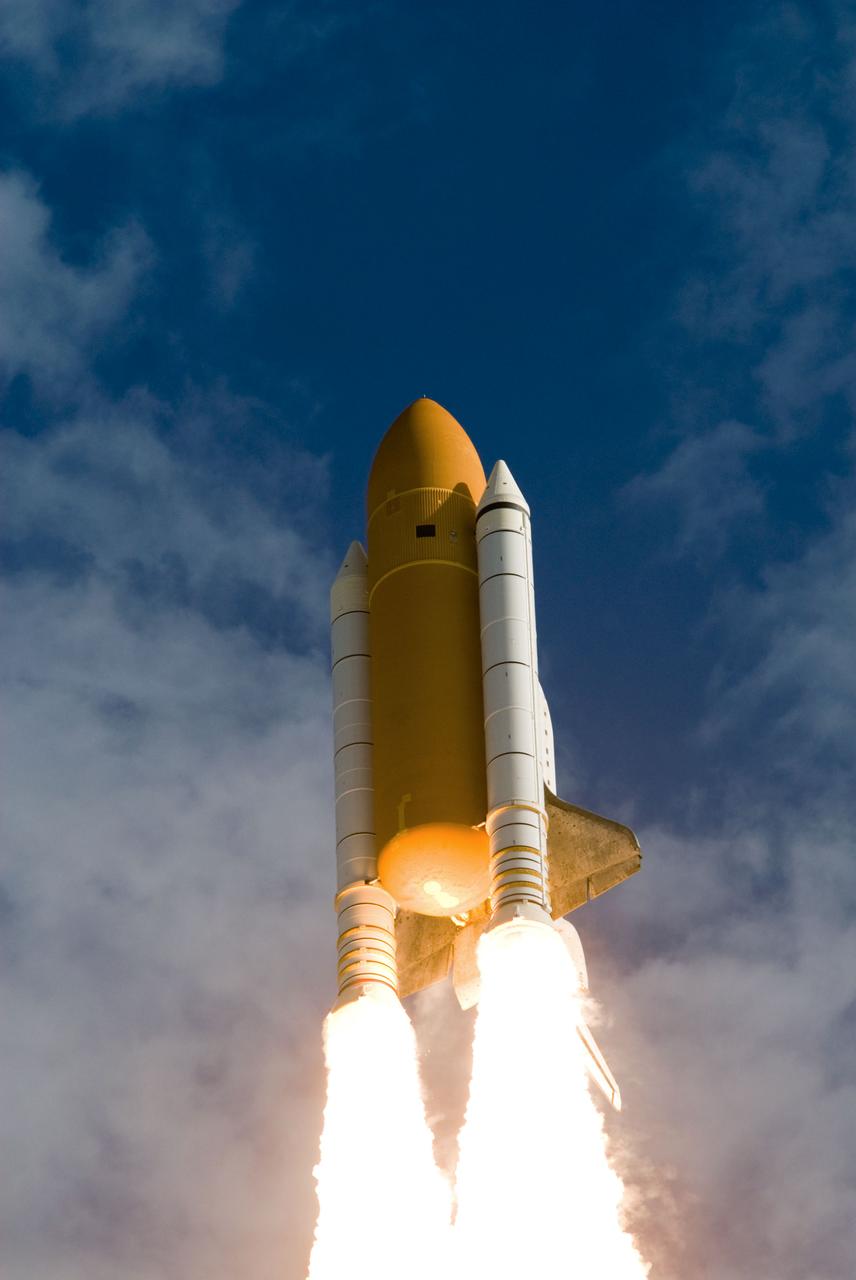 STS129-S-076 (16 Nov. 2009) --- Space Shuttle Atlantis and its six-member STS-129 crew head toward Earth orbit and rendezvous with the International Space Station. Liftoff was on time at 2:28 p.m. (EST) on Nov. 16, 2009 from launch pad 39A at NASA?s Kennedy Space Center, Florida. Onboard are astronauts Charles O. Hobaugh, commander; Barry E. Wilmore, pilot; along with Leland Melvin, Mike Foreman, Robert L. Satcher Jr. and Randy Bresnik, all mission specialists. Atlantis will deliver two Express Logistics Carriers to the station, the largest of the shuttle's cargo carriers, containing 15 spare pieces of equipment including two gyroscopes, two nitrogen tank assemblies, two pump modules, an ammonia tank assembly and a spare latching end effector for the station's robotic arm. Atlantis will return to Earth a station crew member, Nicole Stott, who has spent more than two months aboard the orbiting laboratory. STS-129 is slated to be the final space shuttle Expedition crew rotation flight.