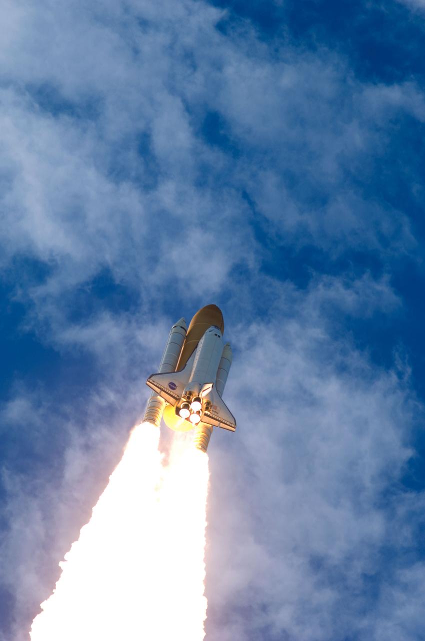 STS129-S-079 (16 Nov. 2009) --- Space Shuttle Atlantis and its six-member STS-129 crew head toward Earth orbit and rendezvous with the International Space Station. Liftoff was on time at 2:28 p.m. (EST) on Nov. 16, 2009 from launch pad 39A at NASA?s Kennedy Space Center, Florida. Onboard are astronauts Charles O. Hobaugh, commander; Barry E. Wilmore, pilot; along with Leland Melvin, Mike Foreman, Robert L. Satcher Jr. and Randy Bresnik, all mission specialists. Atlantis will deliver two Express Logistics Carriers to the station, the largest of the shuttle's cargo carriers, containing 15 spare pieces of equipment including two gyroscopes, two nitrogen tank assemblies, two pump modules, an ammonia tank assembly and a spare latching end effector for the station's robotic arm. Atlantis will return to Earth a station crew member, Nicole Stott, who has spent more than two months aboard the orbiting laboratory. STS-129 is slated to be the final space shuttle Expedition crew rotation flight.