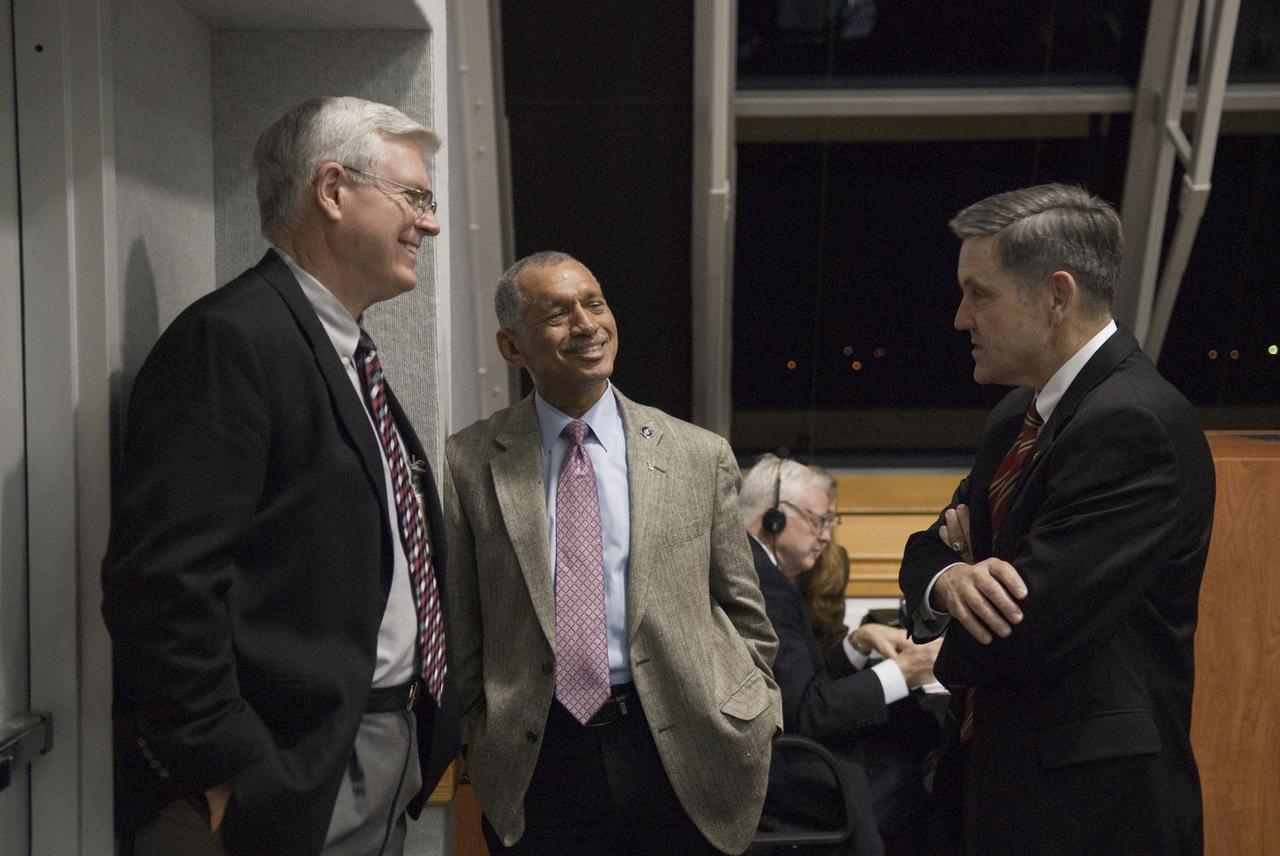 STS130-S-021 (8 Feb. 2010) --- In Firing Room 4 in the Launch Control Center at NASA's Kennedy Space Center in Florida, from left, Johnson Space Center Director Michael L. Coats, NASA Administrator Charles Bolden and Kennedy Space Center Director Robert Cabana find a few minutes to talk before the launch of space shuttle Endeavour. Launch of Endeavour on the STS-130 mission to the International Space Station was at 4:14 a.m. (EST) on Feb. 8, 2010. This was the second launch attempt for Endeavour's STS-130 crew and the final scheduled space shuttle night launch. The first attempt on Feb. 7 was scrubbed due to unfavorable weather. The primary payload for the STS-130 mission to the International Space Station is the Tranquility node, a pressurized module that will provide additional room for crew members and many of the station's life support and environmental control systems. Attached to one end of Tranquility is the Cupola, a unique work area with six windows on its sides and one on top. The Cupola resembles a circular bay window and will provide a vastly improved view of the station's exterior. The multi-directional view will allow the crew to monitor spacewalks and docking operations, as well as provide a spectacular view of Earth and other celestial objects. The module was built in Turin, Italy, by Thales Alenia Space for the European Space Agency. Photo credit: NASA