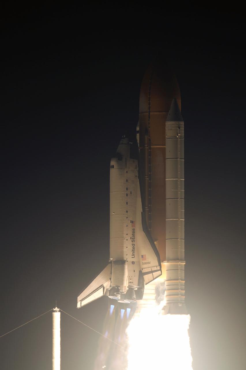 STS130-S-027 (8 Feb. 2010) --- Against a black night sky, space shuttle Endeavour and its six-member STS-130 crew head toward Earth orbit and rendezvous with the International Space Station. Liftoff was at 4:14 a.m. (EST) on Feb. 8, 2010 from launch pad 39A at NASA's Kennedy Space Center. Onboard are NASA astronauts George Zamka, commander; Terry Virts, pilot; Robert Behnken, Kathryn Hire, Nicholas Patrick and Stephen Robinson, all mission specialists. This was the second launch attempt for Endeavour's STS-130 crew and the final scheduled space shuttle night launch. The first attempt on Feb. 7 was scrubbed due to unfavorable weather. The primary payload for the STS-130 mission to the International Space Station is the Tranquility node, a pressurized module that will provide additional room for crew members and many of the station's life support and environmental control systems. Attached to one end of Tranquility is the Cupola module, a unique work area with six windows on its sides and one on top. The Cupola resembles a circular bay window and will provide a vastly improved view of the station's exterior. The multi-directional view will allow the crew to monitor spacewalks and docking operations, as well as provide a spectacular view of Earth and other celestial objects. The module was built in Turin, Italy, by Thales Alenia Space for the European Space Agency.
