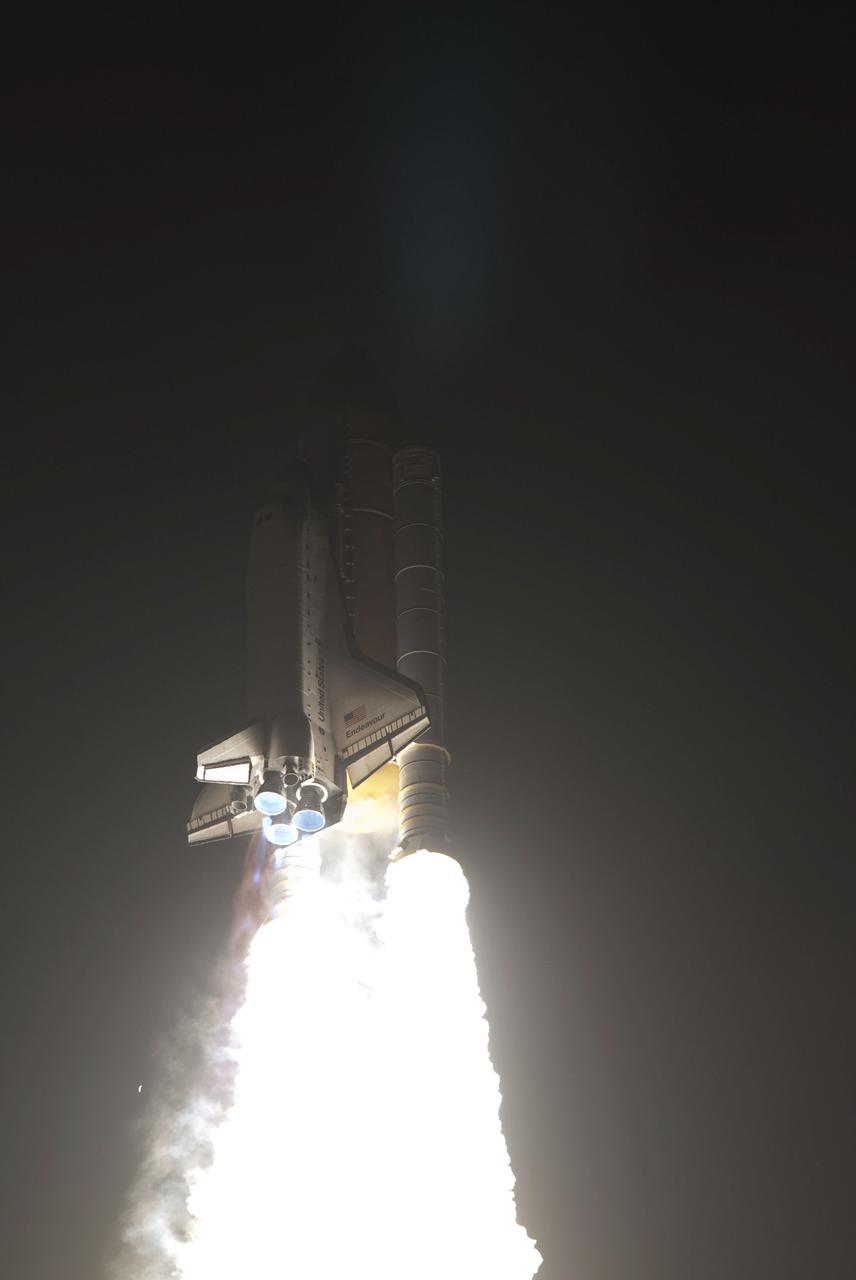 STS130-S-045 (8 Feb. 2010) --- Against a black night sky, space shuttle Endeavour and its six-member STS-130 crew head toward Earth orbit and rendezvous with the International Space Station. Liftoff was at 4:14 a.m. (EST) on Feb. 8, 2010 from launch pad 39A at NASA's Kennedy Space Center. Onboard are NASA astronauts George Zamka, commander; Terry Virts, pilot; Robert Behnken, Kathryn Hire, Nicholas Patrick and Stephen Robinson, all mission specialists. This was the second launch attempt for Endeavour's STS-130 crew and the final scheduled space shuttle night launch. The first attempt on Feb. 7 was scrubbed due to unfavorable weather. The primary payload for the STS-130 mission to the International Space Station is the Tranquility node, a pressurized module that will provide additional room for crew members and many of the station's life support and environmental control systems. Attached to one end of Tranquility is the Cupola module, a unique work area with six windows on its sides and one on top. The Cupola resembles a circular bay window and will provide a vastly improved view of the station's exterior. The multi-directional view will allow the crew to monitor spacewalks and docking operations, as well as provide a spectacular view of Earth and other celestial objects. The module was built in Turin, Italy, by Thales Alenia Space for the European Space Agency.