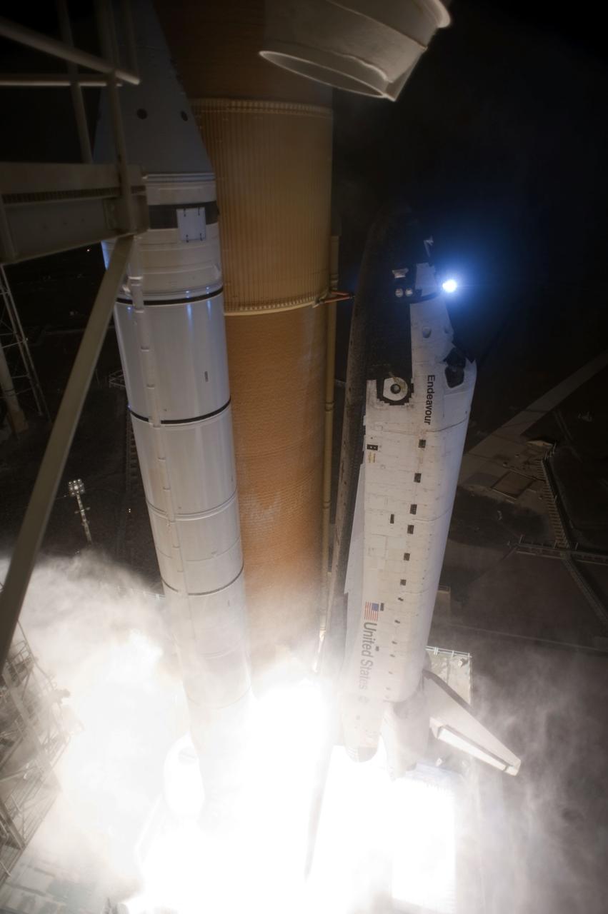 STS130-S-053 (8 Feb. 2010) --- Against a black night sky, space shuttle Endeavour and its six-member STS-130 crew head toward Earth orbit and rendezvous with the International Space Station. Liftoff was at 4:14 a.m. (EST) on Feb. 8, 2010 from launch pad 39A at NASA's Kennedy Space Center. Onboard are NASA astronauts George Zamka, commander; Terry Virts, pilot; Robert Behnken, Kathryn Hire, Nicholas Patrick and Stephen Robinson, all mission specialists. This was the second launch attempt for Endeavour's STS-130 crew and the final scheduled space shuttle night launch. The first attempt on Feb. 7 was scrubbed due to unfavorable weather. The primary payload for the STS-130 mission to the International Space Station is the Tranquility node, a pressurized module that will provide additional room for crew members and many of the station's life support and environmental control systems. Attached to one end of Tranquility is the Cupola module, a unique work area with six windows on its sides and one on top. The Cupola resembles a circular bay window and will provide a vastly improved view of the station's exterior. The multi-directional view will allow the crew to monitor spacewalks and docking operations, as well as provide a spectacular view of Earth and other celestial objects. The module was built in Turin, Italy, by Thales Alenia Space for the European Space Agency.