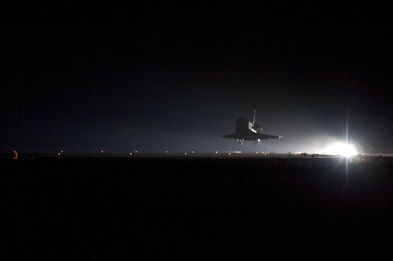 STS130-S-082 (21 Feb. 2010) --- With landing gear down, space shuttle Endeavour approaches Runway 15 at the Shuttle Landing Facility at NASA's Kennedy Space Center in Florida after 14 days in space, completing the 5.7-million-mile STS-130 mission on orbit 217. Main gear touchdown was at 10:20:31 p.m. (EST) on Feb. 21, 2010; followed by nose gear touchdown at 10:20:39 p.m. and wheels stop at 10:22:10 p.m. It was the 23rd night landing in shuttle history and the 17th at Kennedy. Aboard are NASA astronauts George Zamka, commander; Terry Virts, pilot; Robert Behnken, Nicholas Patrick, Kathryn Hire and Stephen Robinson, all mission specialists. During Endeavour's STS-130 mission, astronauts installed the Tranquility node, a module that provides additional room for crew members and many of the station's life support and environmental control systems. Attached to Tranquility is a Cupola with seven windows that provide a panoramic view of Earth, celestial objects and visiting spacecraft. The module was built in Turin, Italy, by Thales Alenia Space for the European Space Agency. The orbiting laboratory is approximately 90 percent complete now in terms of mass. STS-130 was the 24th flight for Endeavour, the 32nd shuttle mission devoted to ISS assembly and maintenance, and the 130th shuttle mission to date.