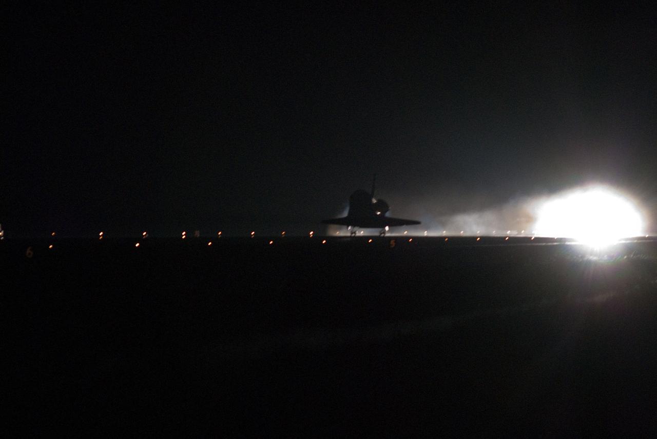 STS130-S-086 (21 Feb. 2010) --- Space shuttle Endeavour lands on Runway 15 at the Shuttle Landing Facility at NASA's Kennedy Space Center in Florida after 14 days in space, completing the 5.7-million-mile STS-130 mission to the International Space Station on orbit 217. Main gear touchdown was at 10:20:31 p.m. (EST) on Feb. 21, 2010; followed by nose gear touchdown at 10:20:39 p.m. and wheels stop at 10:22:10 p.m. It was the 23rd night landing in shuttle history and the 17th at Kennedy. Aboard are NASA astronauts George Zamka, commander; Terry Virts, pilot; Robert Behnken, Nicholas Patrick, Kathryn Hire and Stephen Robinson, all mission specialists. During Endeavour's STS-130 mission, astronauts installed the Tranquility node, a module that provides additional room for crew members and many of the station's life support and environmental control systems. Attached to Tranquility is a Cupola with seven windows that provide a panoramic view of Earth, celestial objects and visiting spacecraft. The module was built in Turin, Italy, by Thales Alenia Space for the European Space Agency. The orbiting laboratory is approximately 90 percent complete now in terms of mass. STS-130 was the 24th flight for Endeavour, the 32nd shuttle mission devoted to ISS assembly and maintenance, and the 130th shuttle mission to date.