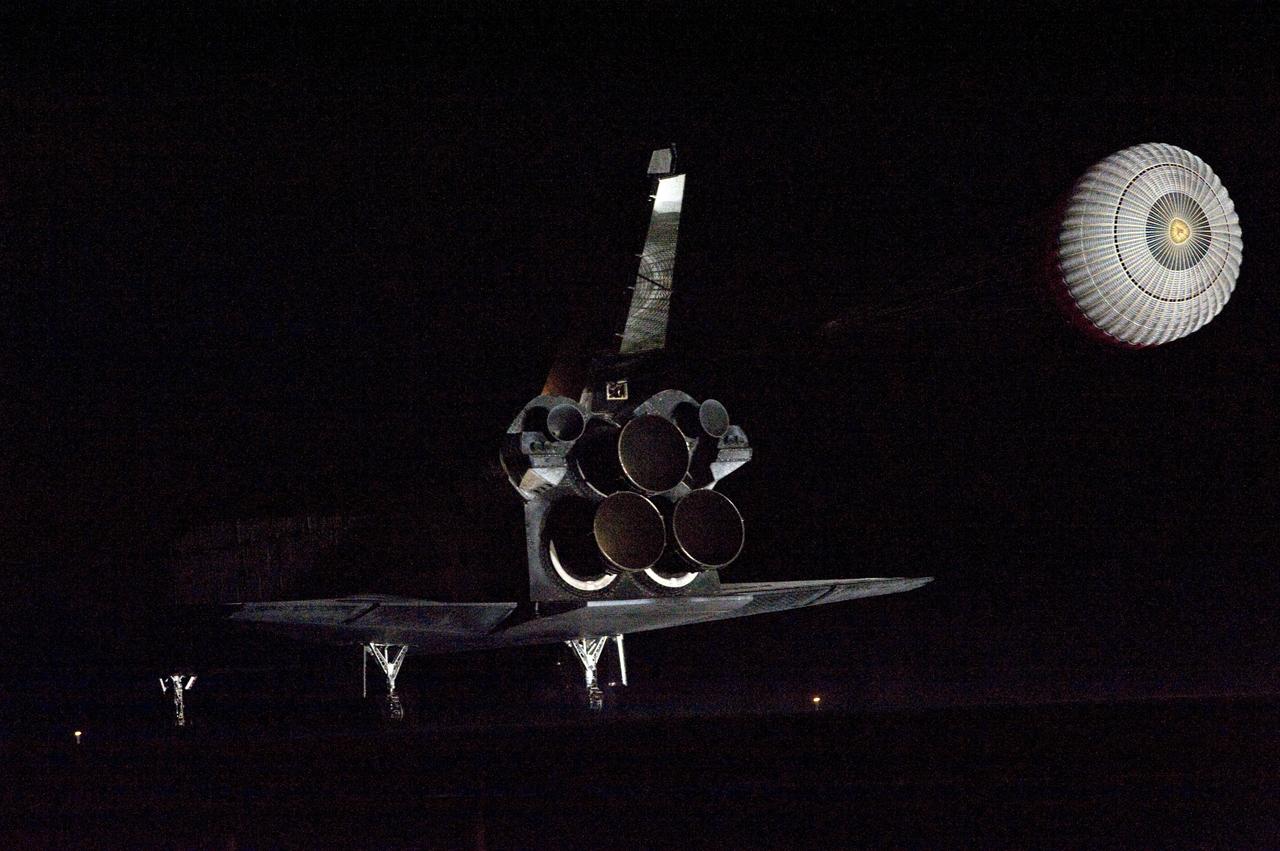 STS130-S-093 (21 Feb. 2010) --- Space shuttle Endeavour?s drag chute is deployed as the spacecraft rolls toward wheels stop on landing Runway 15 at the Shuttle Landing Facility at NASA's Kennedy Space Center in Florida after 14 days in space, completing the 5.7-million-mile STS-130 mission to the International Space Station on orbit 217. Main gear touchdown was at 10:20:31 p.m. (EST) on Feb. 21, 2010; followed by nose gear touchdown at 10:20:39 p.m. and wheels stop at 10:22:10 p.m. It was the 23rd night landing in shuttle history and the 17th at Kennedy. Aboard are NASA astronauts George Zamka, commander; Terry Virts, pilot; Robert Behnken, Nicholas Patrick, Kathryn Hire and Stephen Robinson, all mission specialists. During Endeavour's STS-130 mission, astronauts installed the Tranquility node, a module that provides additional room for crew members and many of the station's life support and environmental control systems. Attached to Tranquility is a Cupola with seven windows that provide a panoramic view of Earth, celestial objects and visiting spacecraft. The module was built in Turin, Italy, by Thales Alenia Space for the European Space Agency. The orbiting laboratory is approximately 90 percent complete now in terms of mass. STS-130 was the 24th flight for Endeavour, the 32nd shuttle mission devoted to ISS assembly and maintenance, and the 130th shuttle mission to date.