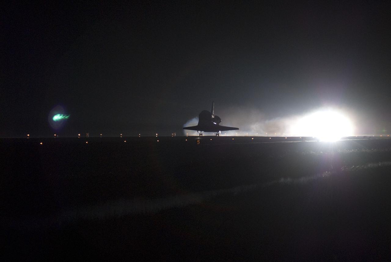STS130-S-094 (21 Feb. 2010) --- Space shuttle Endeavour lands on Runway 15 at the Shuttle Landing Facility at NASA's Kennedy Space Center in Florida after 14 days in space, completing the 5.7-million-mile STS-130 mission to the International Space Station on orbit 217. Main gear touchdown was at 10:20:31 p.m. (EST) on Feb. 21, 2010; followed by nose gear touchdown at 10:20:39 p.m. and wheels stop at 10:22:10 p.m. It was the 23rd night landing in shuttle history and the 17th at Kennedy. Aboard are NASA astronauts George Zamka, commander; Terry Virts, pilot; Robert Behnken, Nicholas Patrick, Kathryn Hire and Stephen Robinson, all mission specialists. During Endeavour's STS-130 mission, astronauts installed the Tranquility node, a module that provides additional room for crew members and many of the station's life support and environmental control systems. Attached to Tranquility is a Cupola with seven windows that provide a panoramic view of Earth, celestial objects and visiting spacecraft. The module was built in Turin, Italy, by Thales Alenia Space for the European Space Agency. The orbiting laboratory is approximately 90 percent complete now in terms of mass. STS-130 was the 24th flight for Endeavour, the 32nd shuttle mission devoted to ISS assembly and maintenance, and the 130th shuttle mission to date.
