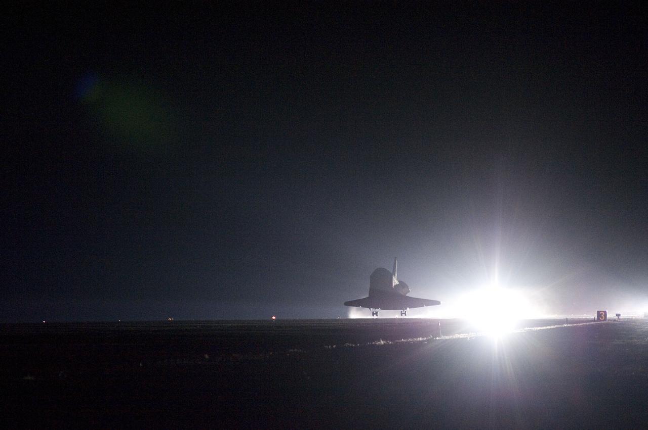 STS130-S-096 (21 Feb. 2010) --- Space shuttle Endeavour lands on Runway 15 at the Shuttle Landing Facility at NASA's Kennedy Space Center in Florida after 14 days in space, completing the 5.7-million-mile STS-130 mission to the International Space Station on orbit 217. Main gear touchdown was at 10:20:31 p.m. (EST) on Feb. 21, 2010; followed by nose gear touchdown at 10:20:39 p.m. and wheels stop at 10:22:10 p.m. It was the 23rd night landing in shuttle history and the 17th at Kennedy. Aboard are NASA astronauts George Zamka, commander; Terry Virts, pilot; Robert Behnken, Nicholas Patrick, Kathryn Hire and Stephen Robinson, all mission specialists. During Endeavour's STS-130 mission, astronauts installed the Tranquility node, a module that provides additional room for crew members and many of the station's life support and environmental control systems. Attached to Tranquility is a Cupola with seven windows that provide a panoramic view of Earth, celestial objects and visiting spacecraft. The module was built in Turin, Italy, by Thales Alenia Space for the European Space Agency. The orbiting laboratory is approximately 90 percent complete now in terms of mass. STS-130 was the 24th flight for Endeavour, the 32nd shuttle mission devoted to ISS assembly and maintenance, and the 130th shuttle mission to date.
