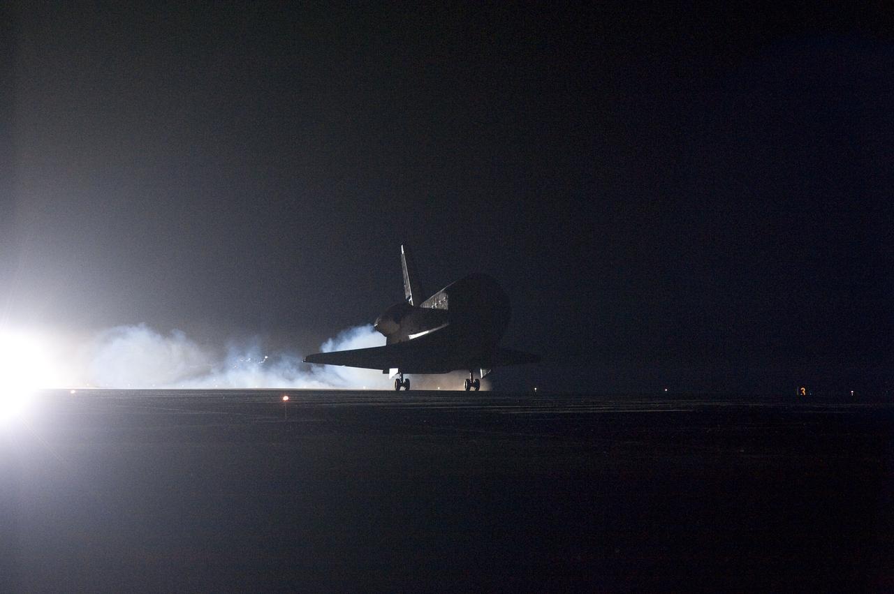 STS130-S-097 (21 Feb. 2010) --- Space shuttle Endeavour lands on Runway 15 at the Shuttle Landing Facility at NASA's Kennedy Space Center in Florida after 14 days in space, completing the 5.7-million-mile STS-130 mission to the International Space Station on orbit 217. Main gear touchdown was at 10:20:31 p.m. (EST) on Feb. 21, 2010; followed by nose gear touchdown at 10:20:39 p.m. and wheels stop at 10:22:10 p.m. It was the 23rd night landing in shuttle history and the 17th at Kennedy. Aboard are NASA astronauts George Zamka, commander; Terry Virts, pilot; Robert Behnken, Nicholas Patrick, Kathryn Hire and Stephen Robinson, all mission specialists. During Endeavour's STS-130 mission, astronauts installed the Tranquility node, a module that provides additional room for crew members and many of the station's life support and environmental control systems. Attached to Tranquility is a Cupola with seven windows that provide a panoramic view of Earth, celestial objects and visiting spacecraft. The module was built in Turin, Italy, by Thales Alenia Space for the European Space Agency. The orbiting laboratory is approximately 90 percent complete now in terms of mass. STS-130 was the 24th flight for Endeavour, the 32nd shuttle mission devoted to ISS assembly and maintenance, and the 130th shuttle mission to date.