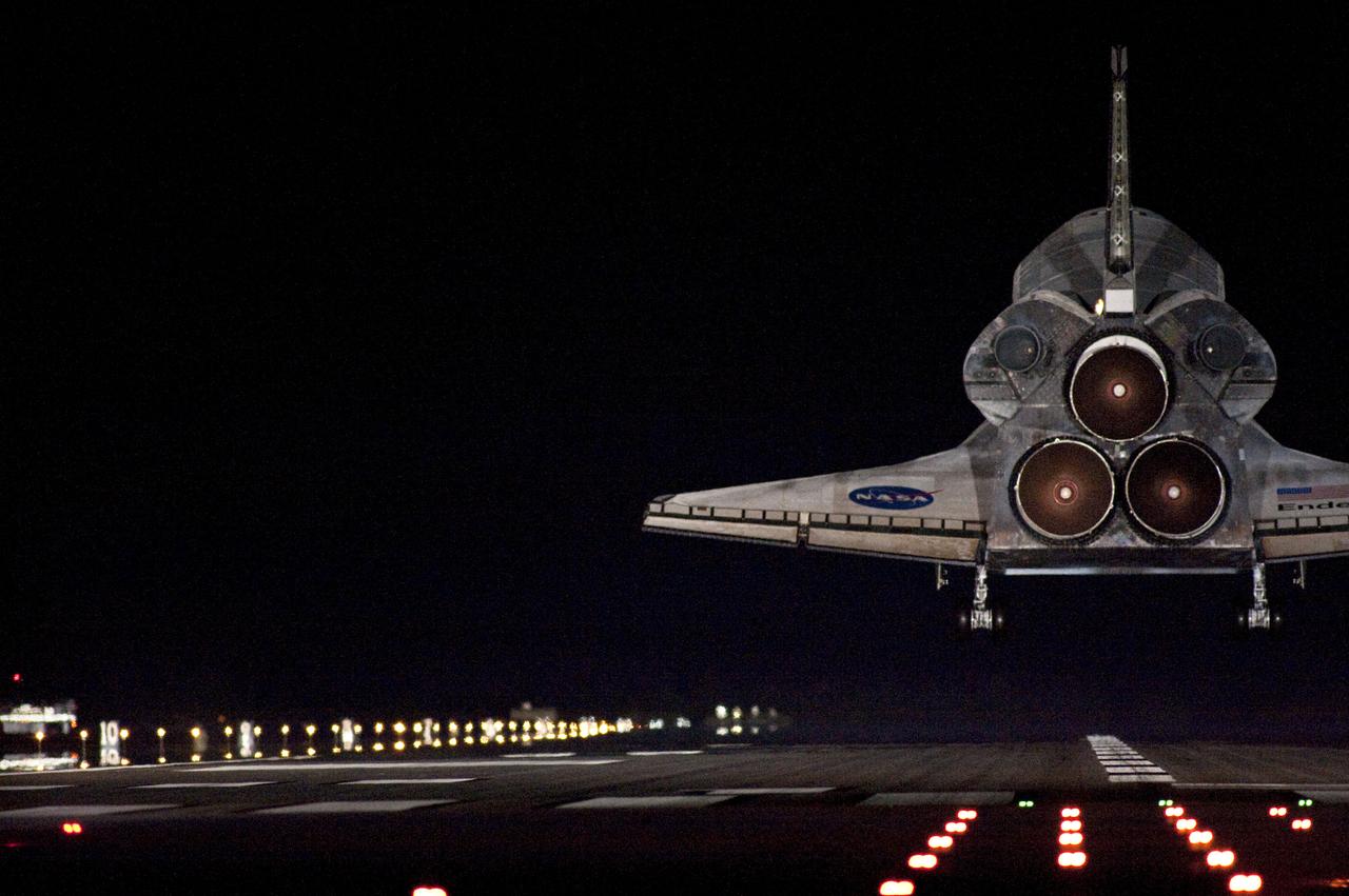 STS130-S-098 (21 Feb. 2010) --- With landing gear down, space shuttle Endeavour approaches Runway 15 at the Shuttle Landing Facility at NASA's Kennedy Space Center in Florida after 14 days in space, completing the 5.7-million-mile STS-130 mission on orbit 217. Main gear touchdown was at 10:20:31 p.m. (EST) on Feb. 21, 2010; followed by nose gear touchdown at 10:20:39 p.m. and wheels stop at 10:22:10 p.m. It was the 23rd night landing in shuttle history and the 17th at Kennedy. Aboard are NASA astronauts George Zamka, commander; Terry Virts, pilot; Robert Behnken, Nicholas Patrick, Kathryn Hire and Stephen Robinson, all mission specialists. During Endeavour's STS-130 mission, astronauts installed the Tranquility node, a module that provides additional room for crew members and many of the station's life support and environmental control systems. Attached to Tranquility is a Cupola with seven windows that provide a panoramic view of Earth, celestial objects and visiting spacecraft. The module was built in Turin, Italy, by Thales Alenia Space for the European Space Agency. The orbiting laboratory is approximately 90 percent complete now in terms of mass. STS-130 was the 24th flight for Endeavour, the 32nd shuttle mission devoted to ISS assembly and maintenance, and the 130th shuttle mission to date.