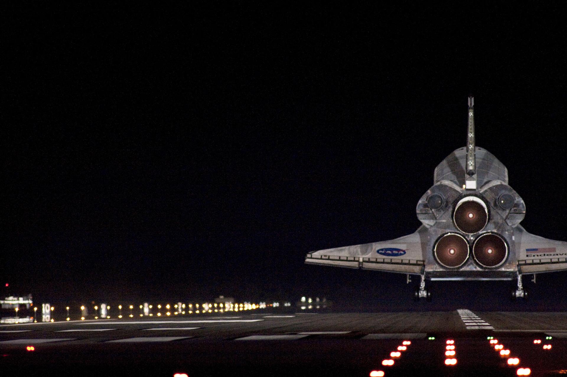 Space Shuttle Endeavour lands at night at Kennedy Space Center in 2010