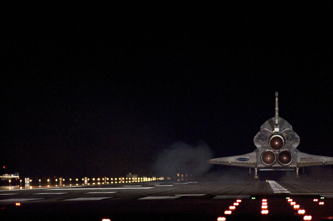 STS130-S-100 (21 Feb. 2010) --- Space shuttle Endeavour lands on Runway 15 at the Shuttle Landing Facility at NASA's Kennedy Space Center in Florida after 14 days in space, completing the 5.7-million-mile STS-130 mission to the International Space Station on orbit 217. Main gear touchdown was at 10:20:31 p.m. (EST) on Feb. 21, 2010; followed by nose gear touchdown at 10:20:39 p.m. and wheels stop at 10:22:10 p.m. It was the 23rd night landing in shuttle history and the 17th at Kennedy. Aboard are NASA astronauts George Zamka, commander; Terry Virts, pilot; Robert Behnken, Nicholas Patrick, Kathryn Hire and Stephen Robinson, all mission specialists. During Endeavour's STS-130 mission, astronauts installed the Tranquility node, a module that provides additional room for crew members and many of the station's life support and environmental control systems. Attached to Tranquility is a Cupola with seven windows that provide a panoramic view of Earth, celestial objects and visiting spacecraft. The module was built in Turin, Italy, by Thales Alenia Space for the European Space Agency. The orbiting laboratory is approximately 90 percent complete now in terms of mass. STS-130 was the 24th flight for Endeavour, the 32nd shuttle mission devoted to ISS assembly and maintenance, and the 130th shuttle mission to date.