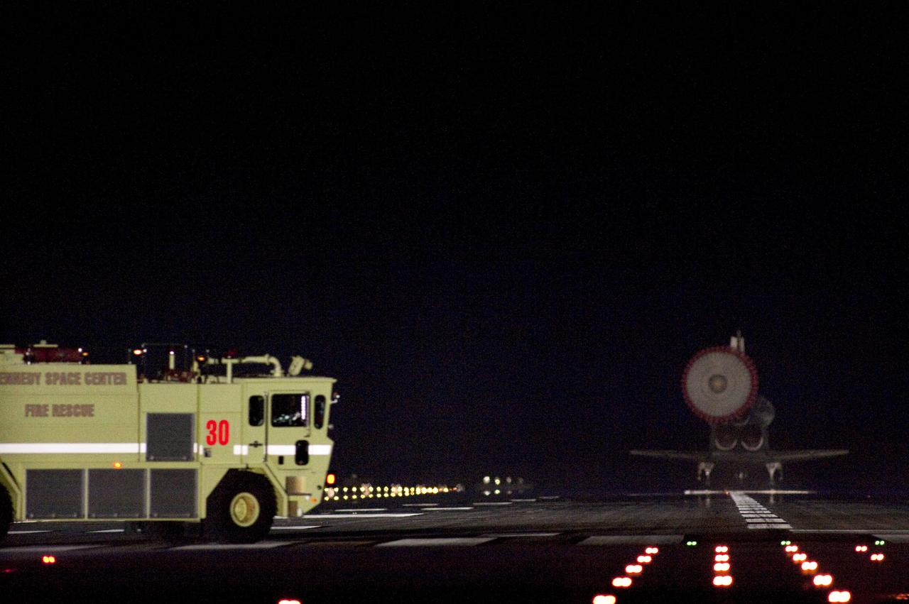 STS130-S-102 (21 Feb. 2010) --- Space shuttle Endeavour lands on Runway 15 at the Shuttle Landing Facility at NASA's Kennedy Space Center in Florida after 14 days in space, completing the 5.7-million-mile STS-130 mission to the International Space Station on orbit 217. Main gear touchdown was at 10:20:31 p.m. (EST) on Feb. 21, 2010; followed by nose gear touchdown at 10:20:39 p.m. and wheels stop at 10:22:10 p.m. It was the 23rd night landing in shuttle history and the 17th at Kennedy. Aboard are NASA astronauts George Zamka, commander; Terry Virts, pilot; Robert Behnken, Nicholas Patrick, Kathryn Hire and Stephen Robinson, all mission specialists. During Endeavour's STS-130 mission, astronauts installed the Tranquility node, a module that provides additional room for crew members and many of the station's life support and environmental control systems. Attached to Tranquility is a Cupola with seven windows that provide a panoramic view of Earth, celestial objects and visiting spacecraft. The module was built in Turin, Italy, by Thales Alenia Space for the European Space Agency. The orbiting laboratory is approximately 90 percent complete now in terms of mass. STS-130 was the 24th flight for Endeavour, the 32nd shuttle mission devoted to ISS assembly and maintenance, and the 130th shuttle mission to date. A fire and rescue truck is in place beside the runway if needed to support the landing of Endeavour.
