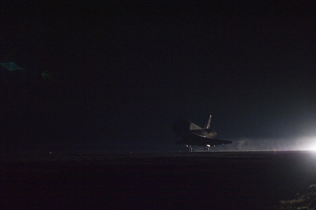 STS130-S-103 (21 Feb. 2010) --- Space shuttle Endeavour lands on Runway 15 at the Shuttle Landing Facility at NASA's Kennedy Space Center in Florida after 14 days in space, completing the 5.7-million-mile STS-130 mission to the International Space Station on orbit 217. Main gear touchdown was at 10:20:31 p.m. (EST) on Feb. 21, 2010; followed by nose gear touchdown at 10:20:39 p.m. and wheels stop at 10:22:10 p.m. It was the 23rd night landing in shuttle history and the 17th at Kennedy. Aboard are NASA astronauts George Zamka, commander; Terry Virts, pilot; Robert Behnken, Nicholas Patrick, Kathryn Hire and Stephen Robinson, all mission specialists. During Endeavour's STS-130 mission, astronauts installed the Tranquility node, a module that provides additional room for crew members and many of the station's life support and environmental control systems. Attached to Tranquility is a Cupola with seven windows that provide a panoramic view of Earth, celestial objects and visiting spacecraft. The module was built in Turin, Italy, by Thales Alenia Space for the European Space Agency. The orbiting laboratory is approximately 90 percent complete now in terms of mass. STS-130 was the 24th flight for Endeavour, the 32nd shuttle mission devoted to ISS assembly and maintenance, and the 130th shuttle mission to date.