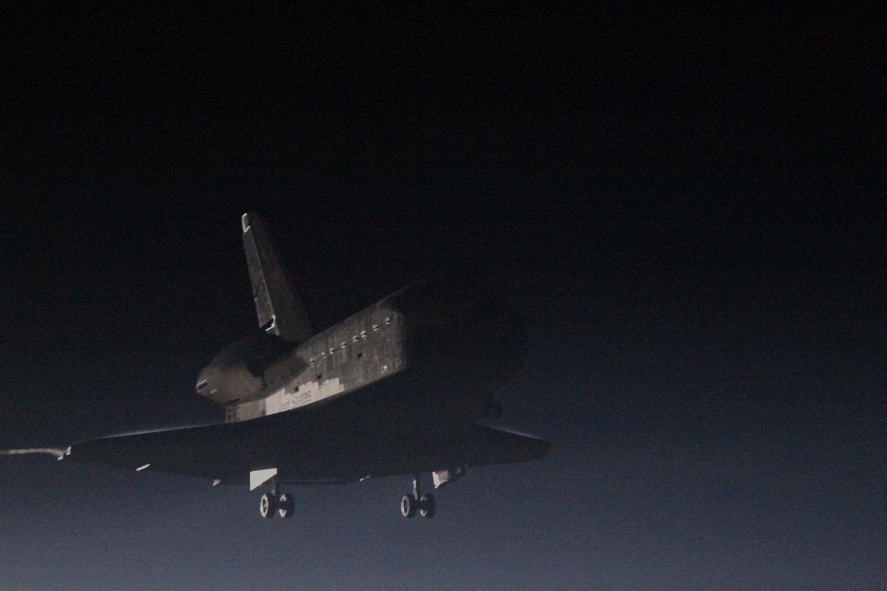 STS130-S-123 (21 Feb. 2010) --- With landing gear down, space shuttle Endeavour nears touchdown on Runway 15 at the Shuttle Landing Facility at NASA's Kennedy Space Center in Florida after 14 days in space, completing the 5.7-million-mile STS-130 mission on orbit 217. Main gear touchdown was at 10:20:31 p.m. (EST) on Feb. 21, 2010; followed by nose gear touchdown at 10:20:39 p.m. and wheels stop at 10:22:10 p.m. It was the 23rd night landing in shuttle history and the 17th at Kennedy. Aboard are NASA astronauts George Zamka, commander; Terry Virts, pilot; Robert Behnken, Nicholas Patrick, Kathryn Hire and Stephen Robinson, all mission specialists. During Endeavour's STS-130 mission, astronauts installed the Tranquility node, a module that provides additional room for crew members and many of the station's life support and environmental control systems. Attached to Tranquility is a Cupola with seven windows that provide a panoramic view of Earth, celestial objects and visiting spacecraft. The module was built in Turin, Italy, by Thales Alenia Space for the European Space Agency. The orbiting laboratory is approximately 90 percent complete now in terms of mass. STS-130 was the 24th flight for Endeavour, the 32nd shuttle mission devoted to ISS assembly and maintenance, and the 130th shuttle mission to date.