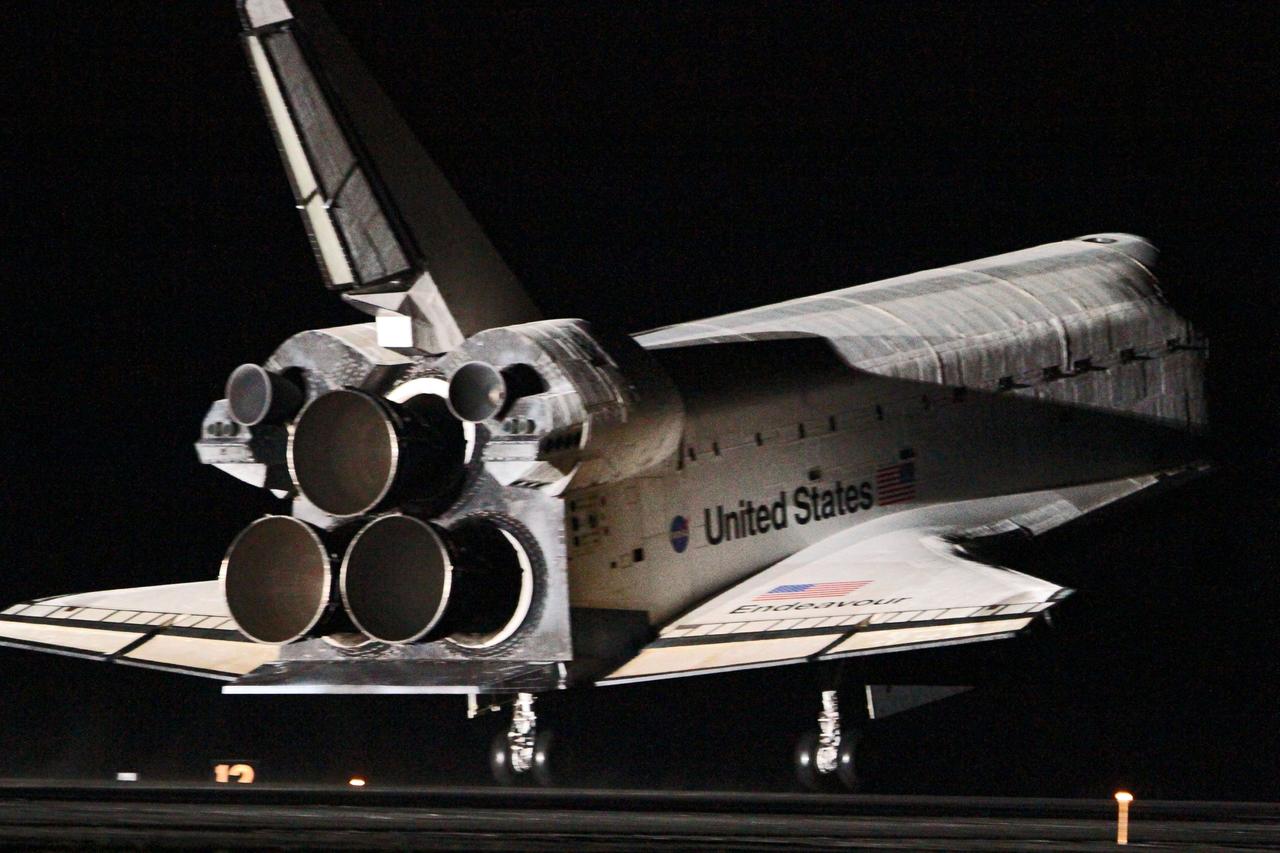 STS130-S-125 (21 Feb. 2010) --- Space shuttle Endeavour lands on Runway 15 at the Shuttle Landing Facility at NASA's Kennedy Space Center in Florida after 14 days in space, completing the 5.7-million-mile STS-130 mission to the International Space Station on orbit 217. Main gear touchdown was at 10:20:31 p.m. (EST) on Feb. 21, 2010; followed by nose gear touchdown at 10:20:39 p.m. and wheels stop at 10:22:10 p.m. It was the 23rd night landing in shuttle history and the 17th at Kennedy. Aboard are NASA astronauts George Zamka, commander; Terry Virts, pilot; Robert Behnken, Nicholas Patrick, Kathryn Hire and Stephen Robinson, all mission specialists. During Endeavour's STS-130 mission, astronauts installed the Tranquility node, a module that provides additional room for crew members and many of the station's life support and environmental control systems. Attached to Tranquility is a Cupola with seven windows that provide a panoramic view of Earth, celestial objects and visiting spacecraft. The module was built in Turin, Italy, by Thales Alenia Space for the European Space Agency. The orbiting laboratory is approximately 90 percent complete now in terms of mass. STS-130 was the 24th flight for Endeavour, the 32nd shuttle mission devoted to ISS assembly and maintenance, and the 130th shuttle mission to date.