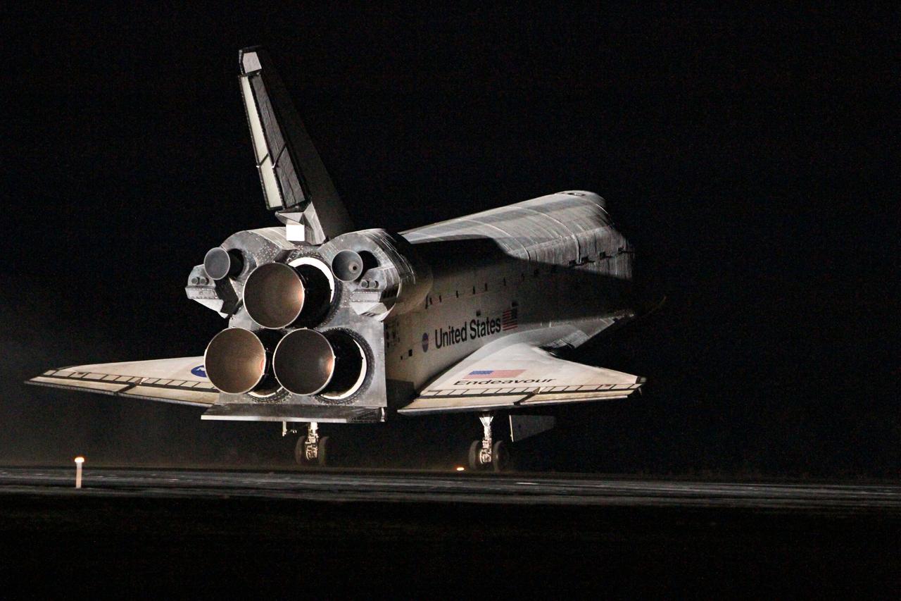 STS130-S-126 (21 Feb. 2010) --- Space shuttle Endeavour lands on Runway 15 at the Shuttle Landing Facility at NASA's Kennedy Space Center in Florida after 14 days in space, completing the 5.7-million-mile STS-130 mission to the International Space Station on orbit 217. Main gear touchdown was at 10:20:31 p.m. (EST) on Feb. 21, 2010; followed by nose gear touchdown at 10:20:39 p.m. and wheels stop at 10:22:10 p.m. It was the 23rd night landing in shuttle history and the 17th at Kennedy. Aboard are NASA astronauts George Zamka, commander; Terry Virts, pilot; Robert Behnken, Nicholas Patrick, Kathryn Hire and Stephen Robinson, all mission specialists. During Endeavour's STS-130 mission, astronauts installed the Tranquility node, a module that provides additional room for crew members and many of the station's life support and environmental control systems. Attached to Tranquility is a Cupola with seven windows that provide a panoramic view of Earth, celestial objects and visiting spacecraft. The module was built in Turin, Italy, by Thales Alenia Space for the European Space Agency. The orbiting laboratory is approximately 90 percent complete now in terms of mass. STS-130 was the 24th flight for Endeavour, the 32nd shuttle mission devoted to ISS assembly and maintenance, and the 130th shuttle mission to date.