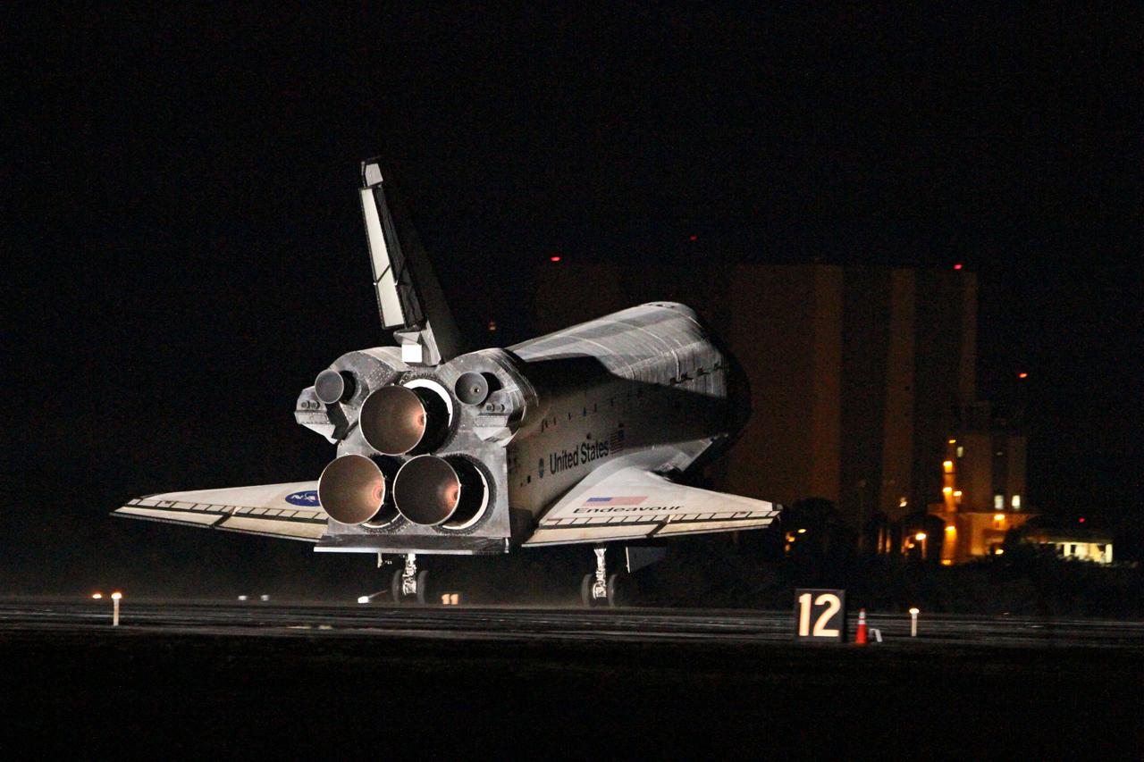STS130-S-127 (21 Feb. 2010) --- Space shuttle Endeavour lands on Runway 15 at the Shuttle Landing Facility at NASA's Kennedy Space Center in Florida after 14 days in space, completing the 5.7-million-mile STS-130 mission to the International Space Station on orbit 217. Main gear touchdown was at 10:20:31 p.m. (EST) on Feb. 21, 2010; followed by nose gear touchdown at 10:20:39 p.m. and wheels stop at 10:22:10 p.m. It was the 23rd night landing in shuttle history and the 17th at Kennedy. Aboard are NASA astronauts George Zamka, commander; Terry Virts, pilot; Robert Behnken, Nicholas Patrick, Kathryn Hire and Stephen Robinson, all mission specialists. During Endeavour's STS-130 mission, astronauts installed the Tranquility node, a module that provides additional room for crew members and many of the station's life support and environmental control systems. Attached to Tranquility is a Cupola with seven windows that provide a panoramic view of Earth, celestial objects and visiting spacecraft. The module was built in Turin, Italy, by Thales Alenia Space for the European Space Agency. The orbiting laboratory is approximately 90 percent complete now in terms of mass. STS-130 was the 24th flight for Endeavour, the 32nd shuttle mission devoted to ISS assembly and maintenance, and the 130th shuttle mission to date.