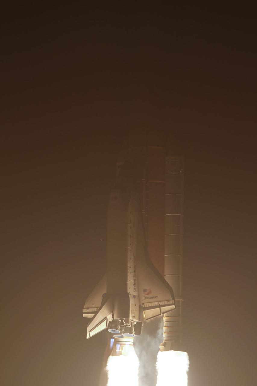 STS131-S-019 (5 April 2010) --- Space shuttle Discovery and its seven-member STS-131 crew head toward Earth orbit and rendezvous with the International Space Station. Liftoff was at 6:21 a.m. (EDT) on April 5, 2010, from launch pad 39A at NASA's Kennedy Space Center. Onboard are NASA astronauts Alan Poindexter, commander; James P. Dutton Jr., pilot; Rick Mastracchio, Dorothy Metcalf-Lindenburger, Stephanie Wilson and Clayton Anderson; along with Japan Aerospace Exploration Agency (JAXA) astronaut Naoko Yamazaki, all mission specialists. The crew will deliver the multi-purpose logistics module Leonardo, filled with supplies, a new crew sleeping quarters and science racks that will be transferred to the International Space Station's laboratories. The crew also will switch out a gyroscope on the station’s truss structure, install a spare ammonia storage tank and retrieve a Japanese experiment from the station’s exterior. STS-131 is the 33rd shuttle mission to the station and the 131st shuttle mission overall.
