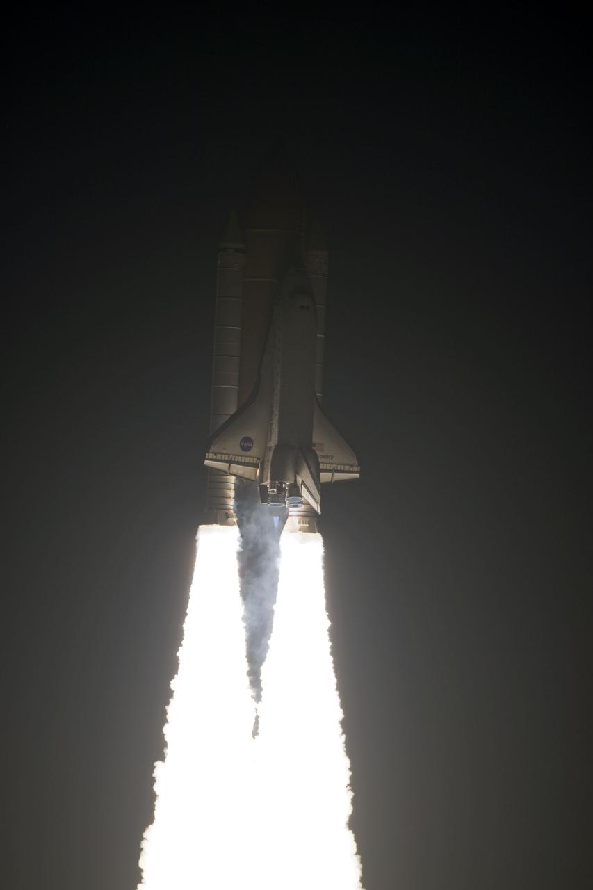 STS131-S-031 (5 April 2010) --- Space shuttle Discovery and its seven-member STS-131 crew head toward Earth orbit and rendezvous with the International Space Station. Liftoff was at 6:21 a.m. (EDT) on April 5, 2010, from launch pad 39A at NASA's Kennedy Space Center. Onboard are NASA astronauts Alan Poindexter, commander; James P. Dutton Jr., pilot; Rick Mastracchio, Dorothy Metcalf-Lindenburger, Stephanie Wilson and Clayton Anderson; along with Japan Aerospace Exploration Agency (JAXA) astronaut Naoko Yamazaki, all mission specialists. The crew will deliver the multi-purpose logistics module Leonardo, filled with supplies, a new crew sleeping quarters and science racks that will be transferred to the International Space Station's laboratories. The crew also will switch out a gyroscope on the station’s truss structure, install a spare ammonia storage tank and retrieve a Japanese experiment from the station’s exterior. STS-131 is the 33rd shuttle mission to the station and the 131st shuttle mission overall.