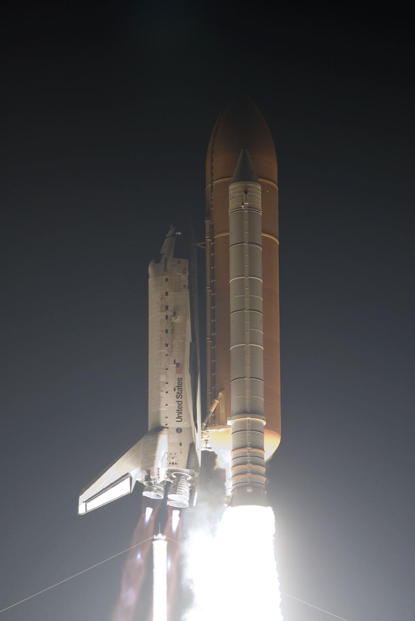 STS131-S-062 (5 April 2010) --- Space shuttle Discovery and its seven-member STS-131 crew head toward Earth orbit and rendezvous with the International Space Station. Liftoff was at 6:21 a.m. (EDT) on April 5, 2010, from launch pad 39A at NASA's Kennedy Space Center. Onboard are NASA astronauts Alan Poindexter, commander; James P. Dutton Jr., pilot; Rick Mastracchio, Dorothy Metcalf-Lindenburger, Stephanie Wilson and Clayton Anderson; along with Japan Aerospace Exploration Agency (JAXA) astronaut Naoko Yamazaki, all mission specialists. The crew will deliver the multi-purpose logistics module Leonardo, filled with supplies, a new crew sleeping quarters and science racks that will be transferred to the International Space Station's laboratories. The crew also will switch out a gyroscope on the station’s truss structure, install a spare ammonia storage tank and retrieve a Japanese experiment from the station’s exterior. STS-131 is the 33rd shuttle mission to the station and the 131st shuttle mission overall.
