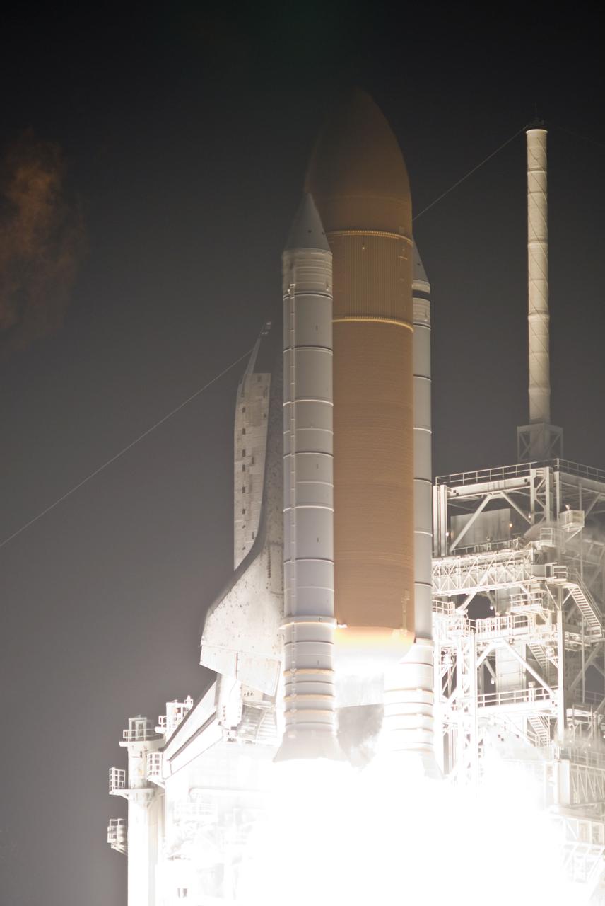 STS131-S-075 (5 April 2010) --- Space shuttle Discovery and its seven-member STS-131 crew head toward Earth orbit and rendezvous with the International Space Station. Liftoff was at 6:21 a.m. (EDT) on April 5, 2010, from launch pad 39A at NASA's Kennedy Space Center. Onboard are NASA astronauts Alan Poindexter, commander; James P. Dutton Jr., pilot; Rick Mastracchio, Dorothy Metcalf-Lindenburger, Stephanie Wilson and Clayton Anderson; along with Japan Aerospace Exploration Agency (JAXA) astronaut Naoko Yamazaki, all mission specialists. The crew will deliver the multi-purpose logistics module Leonardo, filled with supplies, a new crew sleeping quarters and science racks that will be transferred to the International Space Station's laboratories. The crew also will switch out a gyroscope on the station’s truss structure, install a spare ammonia storage tank and retrieve a Japanese experiment from the station’s exterior. STS-131 is the 33rd shuttle mission to the station and the 131st shuttle mission overall.